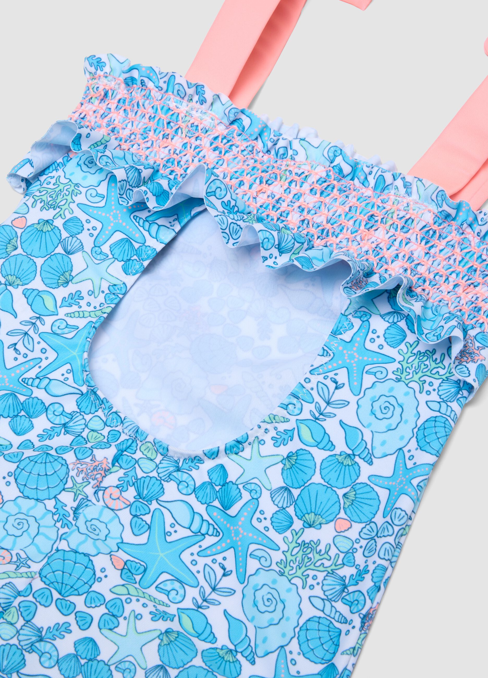 Blue stretch swimsuit with marine print for girls