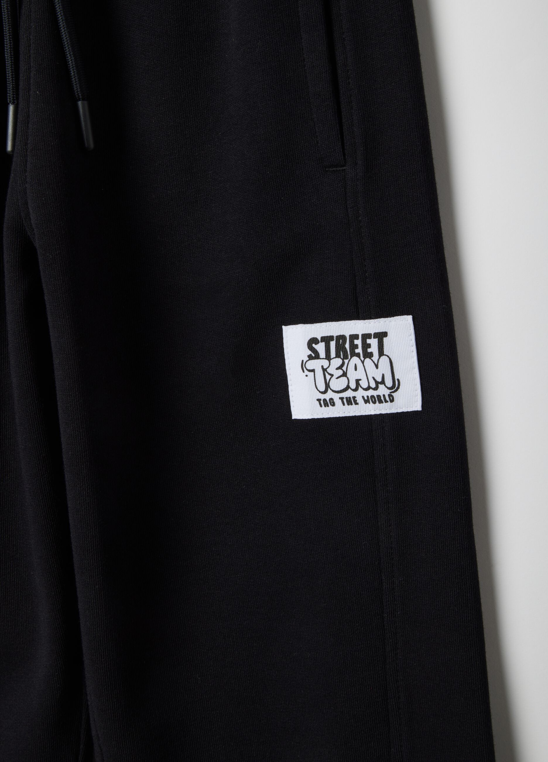 Children's black pure cotton jogger trousers regular fit with patch