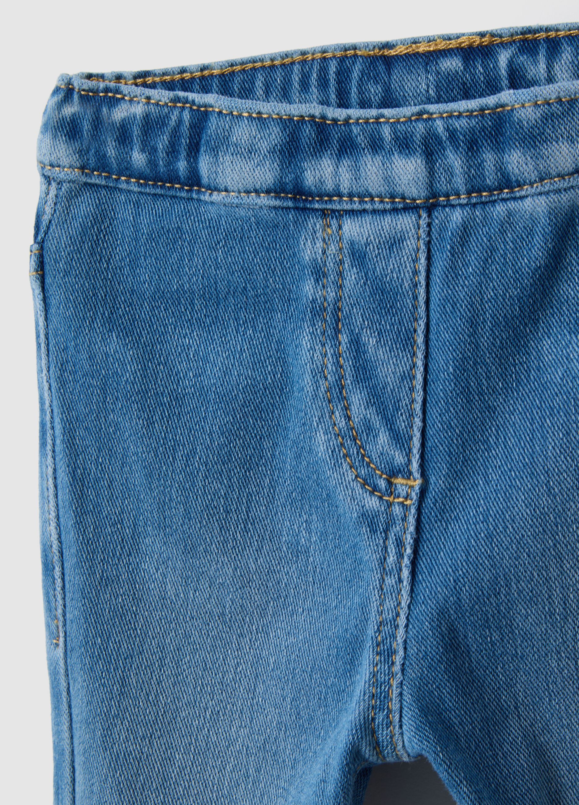 Blue denim jeggings in cotton blend flare fit for girls