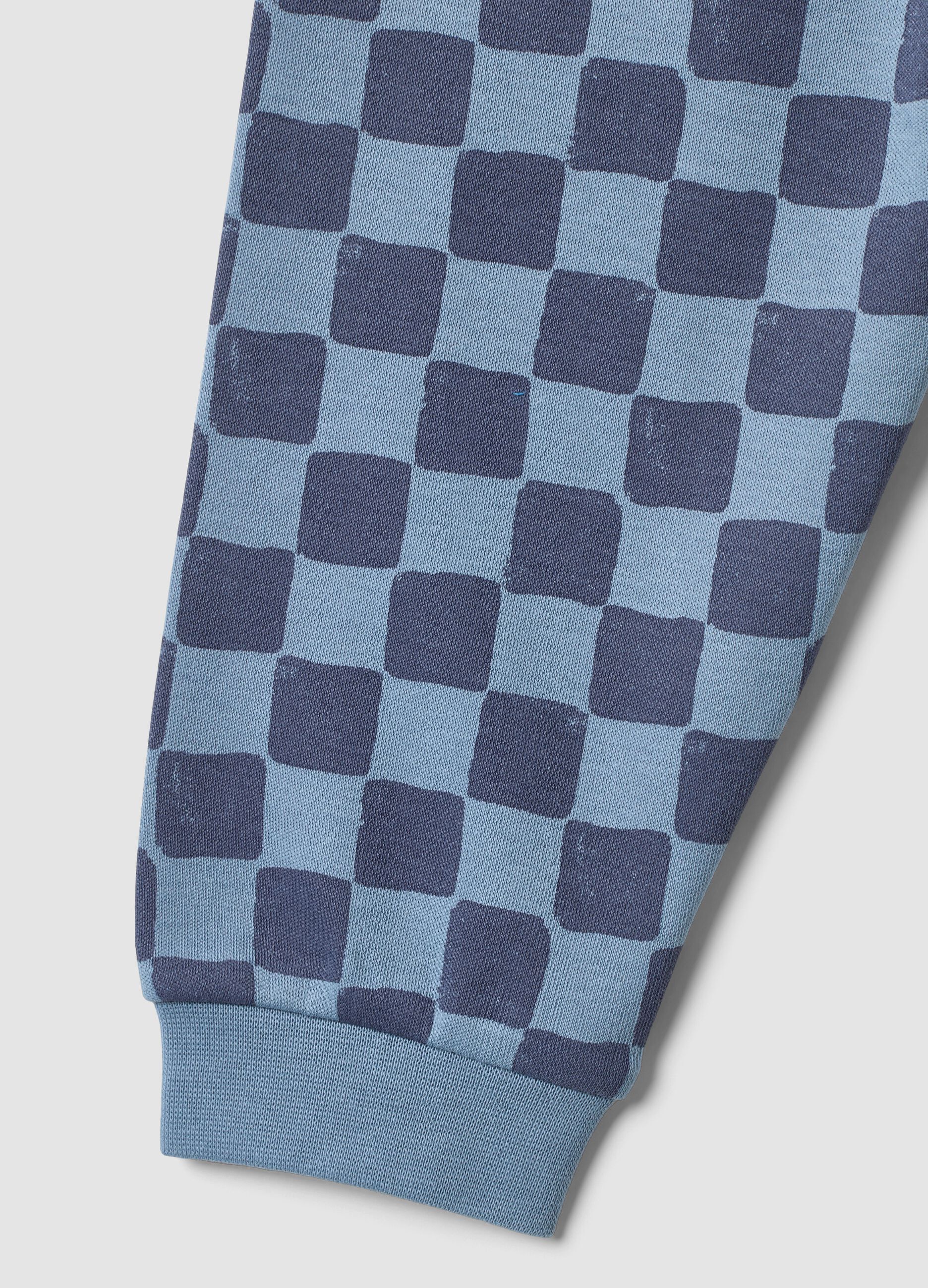 Blue organic cotton baby pyjamas with checked trousers