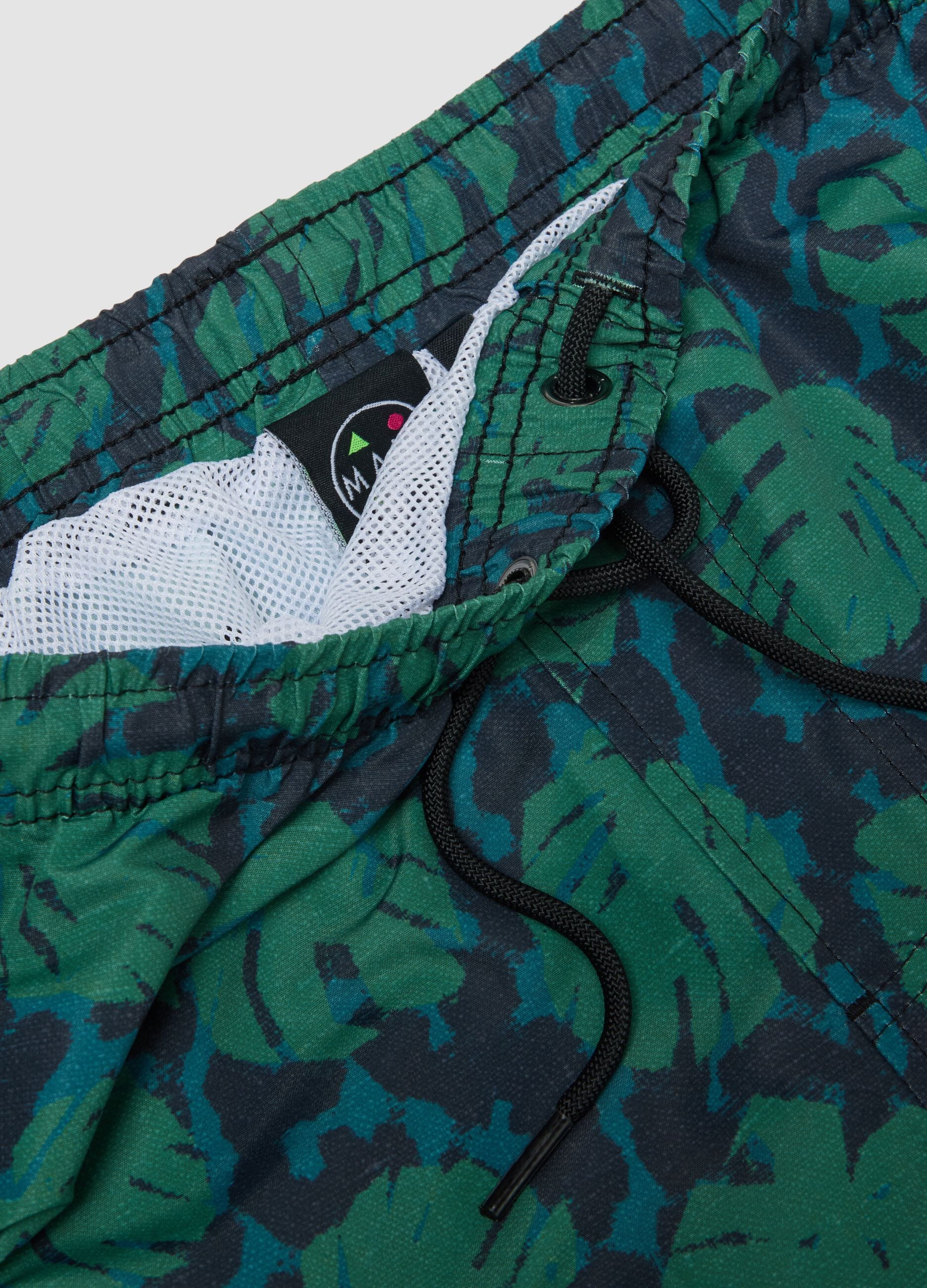Multicolour tropical print swim shorts