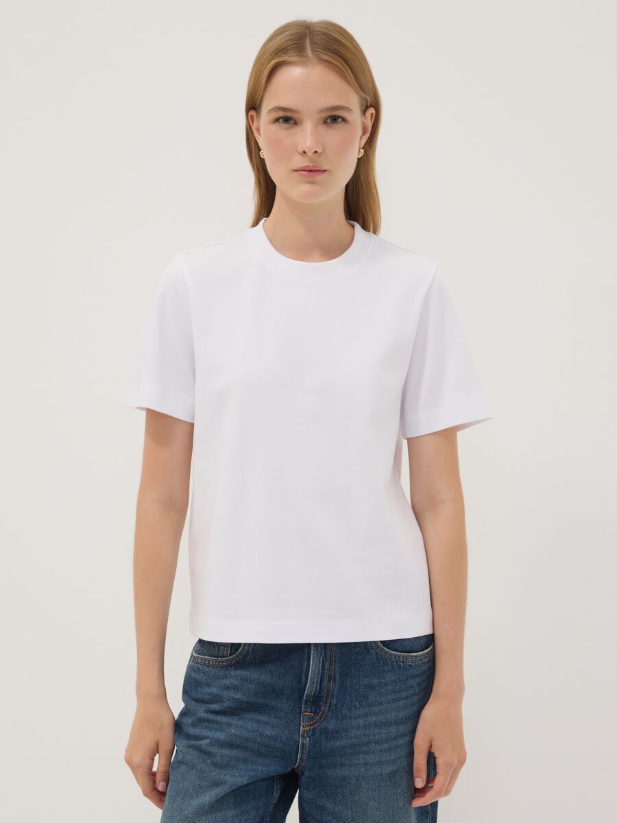 T-shirt relaxed fit bianca in puro cotone a maniche corte_1