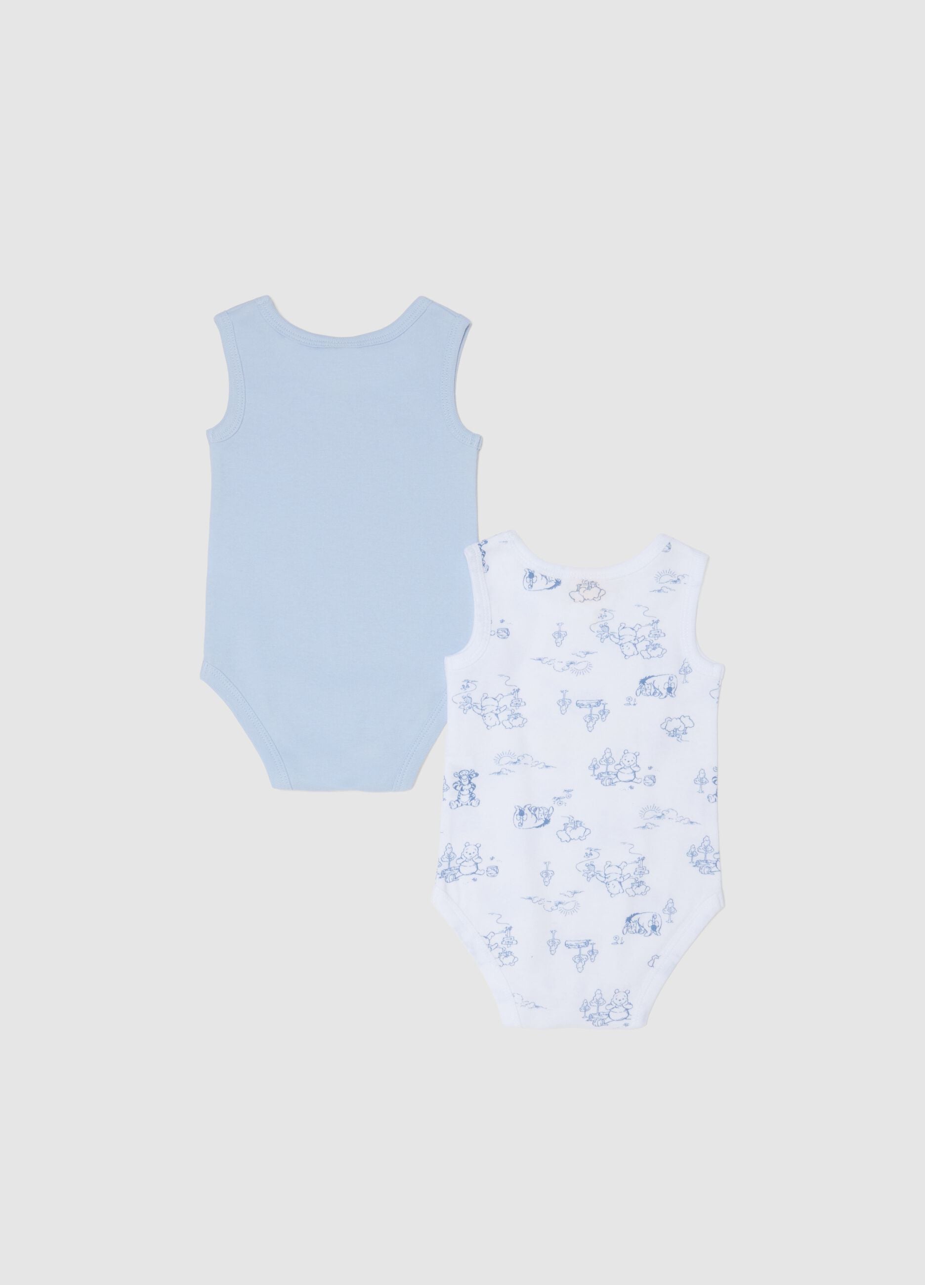 Pack of multicolour newborn cotton bodysuits with Winnie-The-Pooh