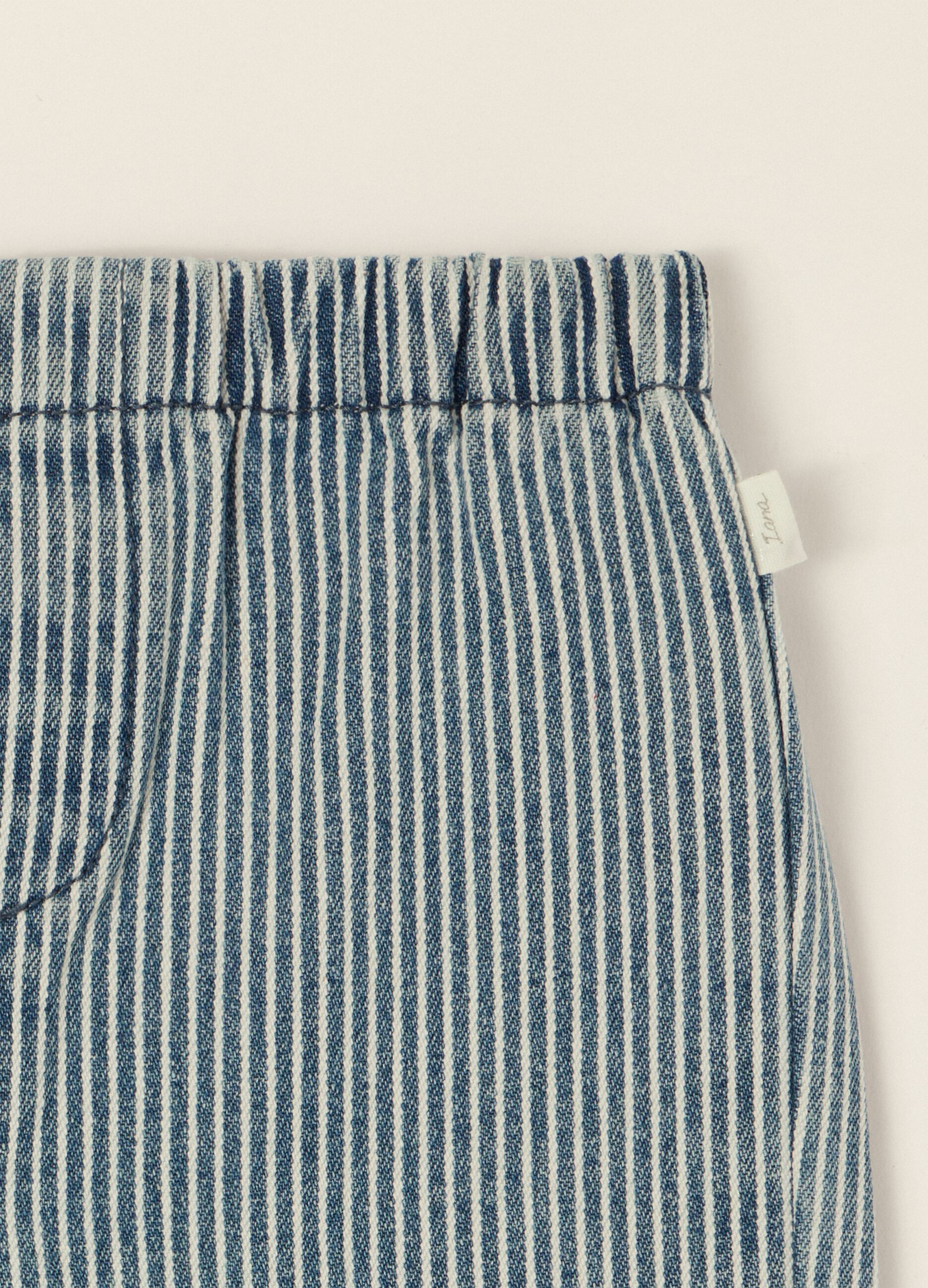 Baby striped denim trousers in a cotton, viscose and lyocell blend