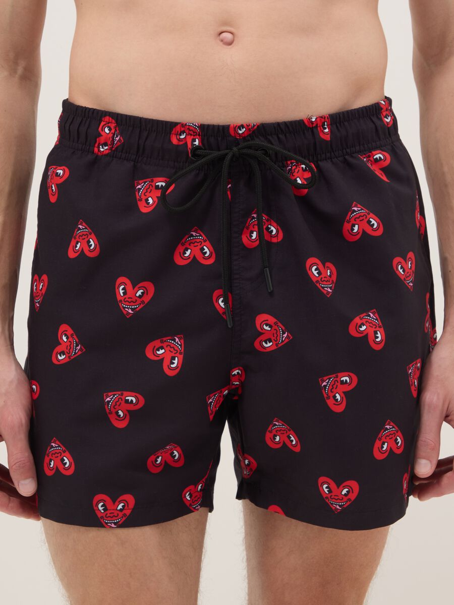 Black beach boxers with Keith Haring heart prints_1