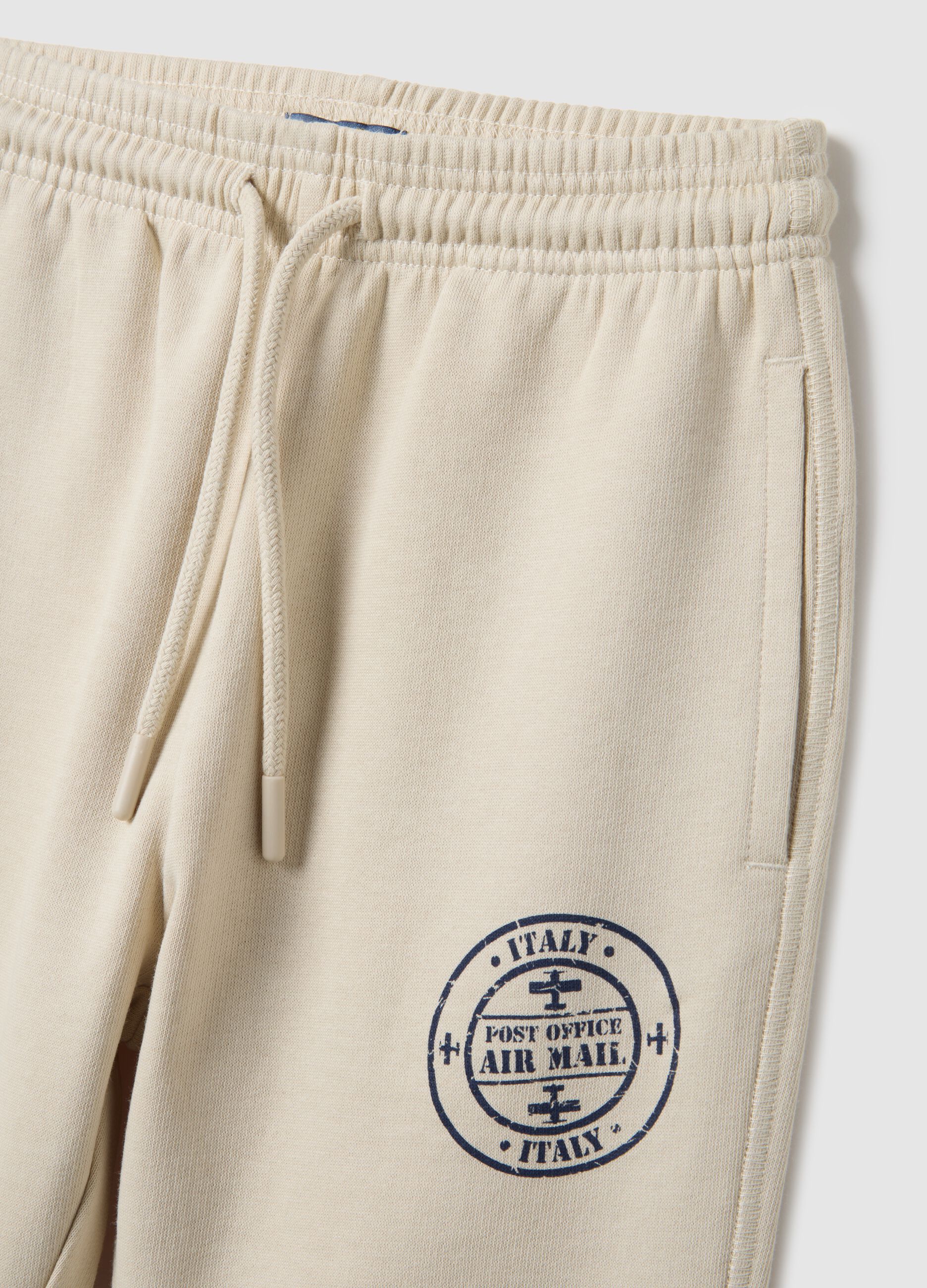 Kids' beige jogger trousers in pure cotton regular fit with logo