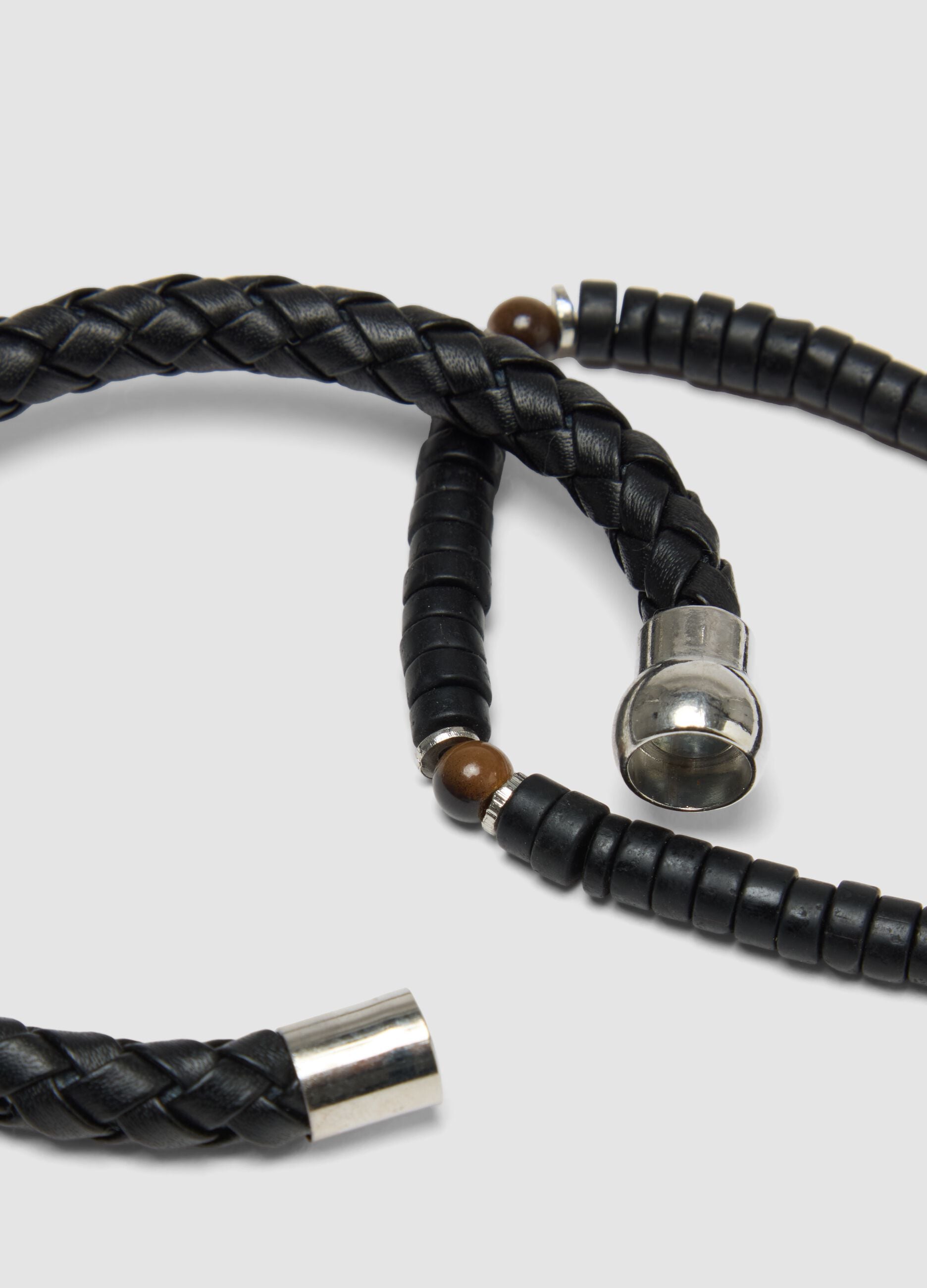 Pack of black woven and beaded bracelets