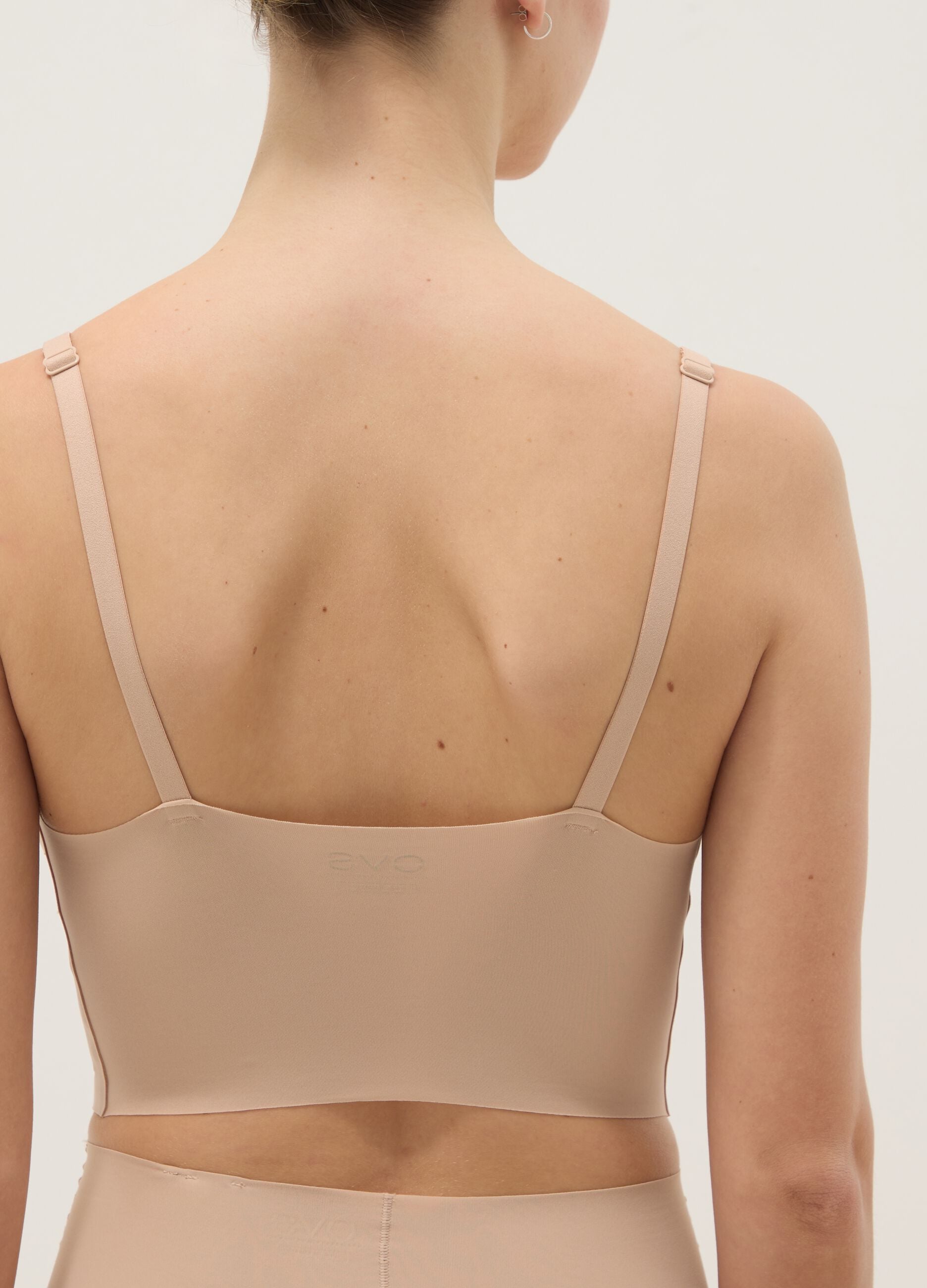 Beige bra without padding with adjustable straps