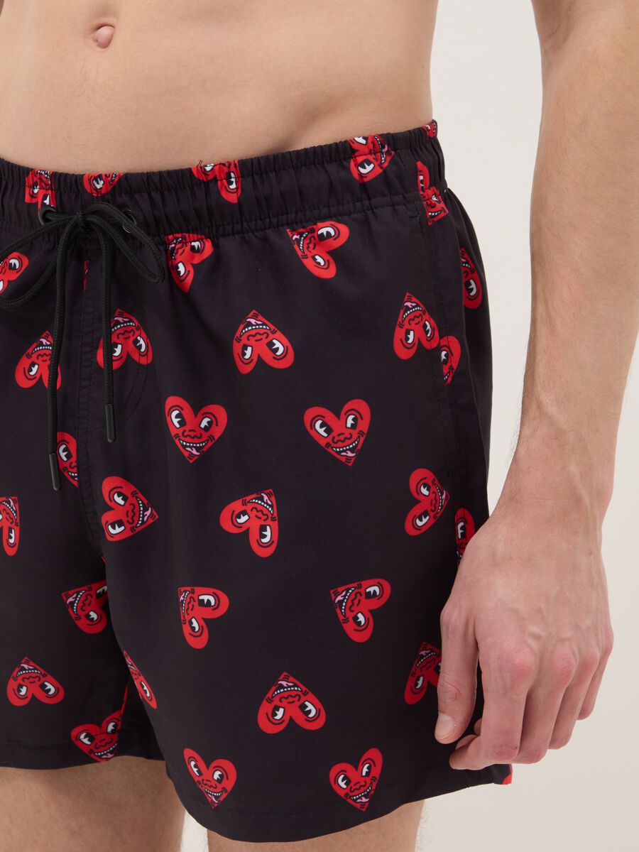 Black beach boxers with Keith Haring heart prints_3