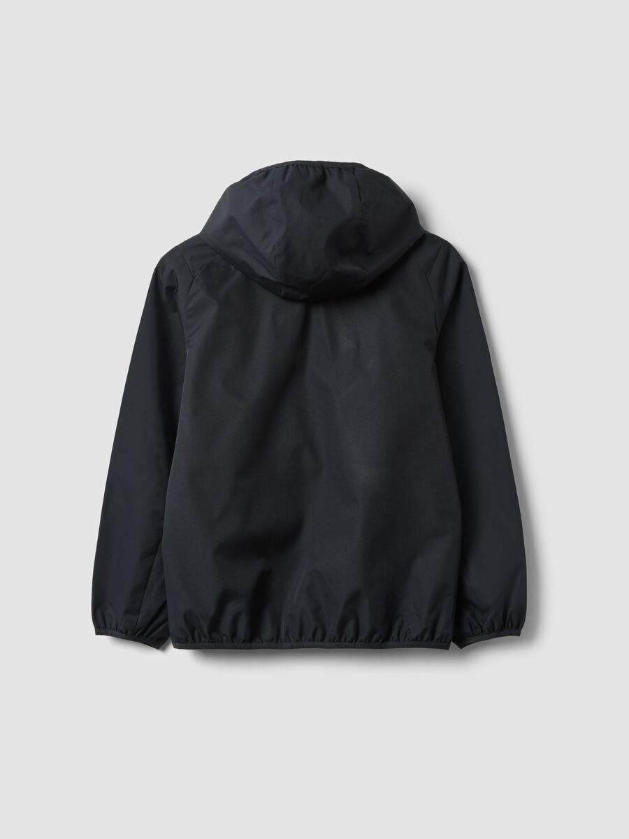 Black oversized rain jacket with hood and zip for boys_1