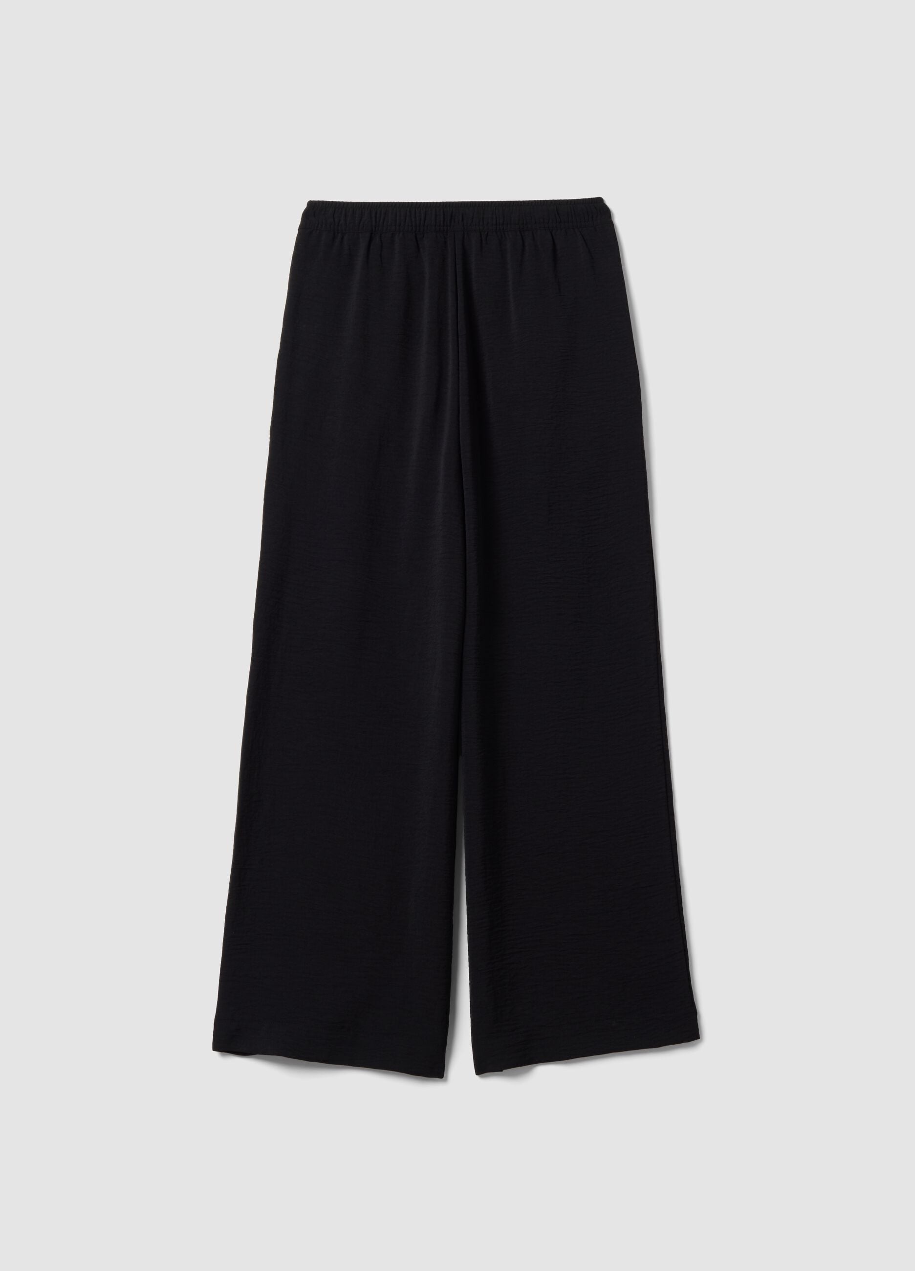 Pantaloni neri wide leg con vita elasticizzata