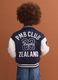 Blue varsity jacket with beige sleeves and print for boys_2