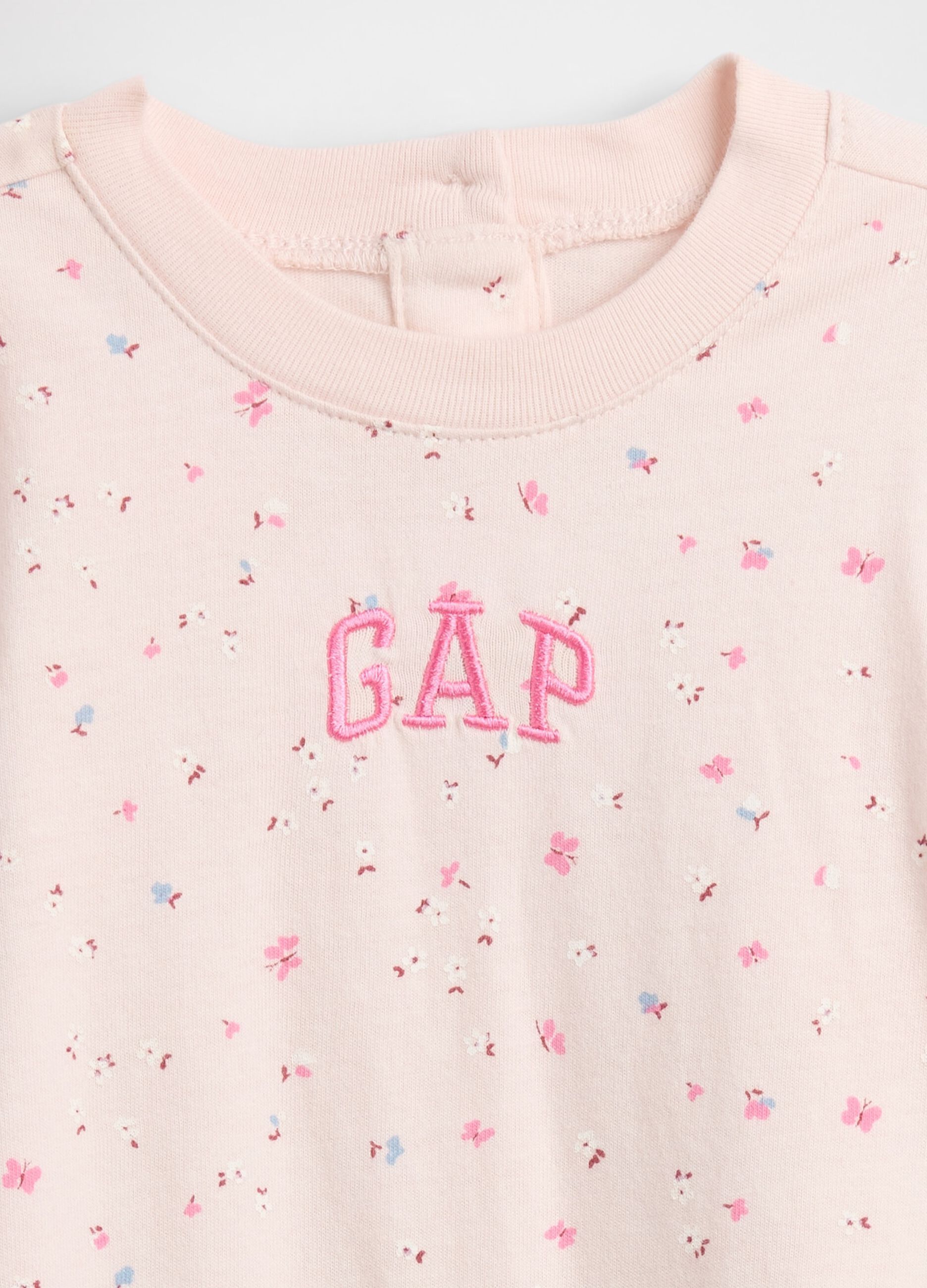 Pink cotton jumpsuit with print