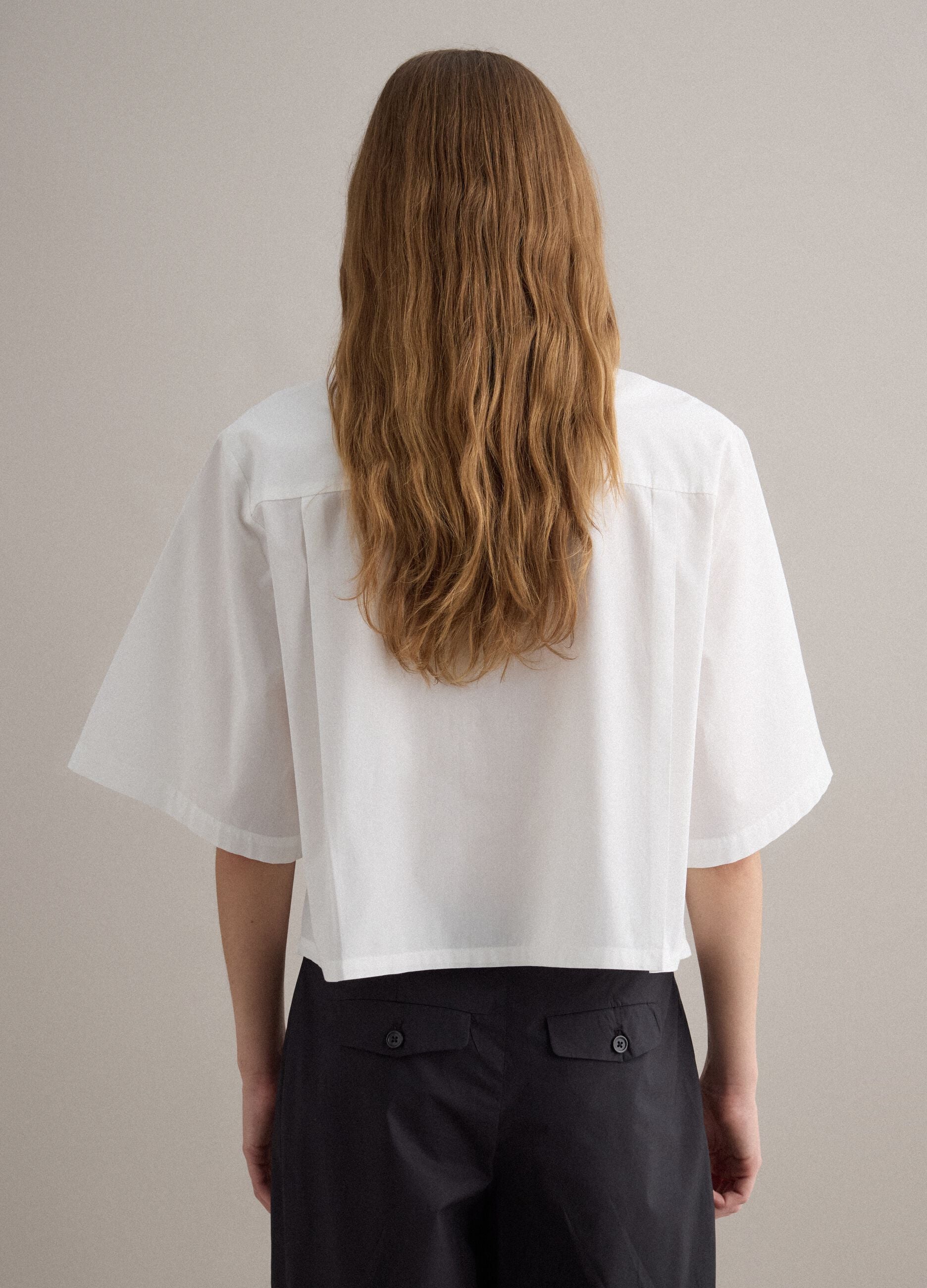 White pure-cotton shirt with patch pocket and oversized fit