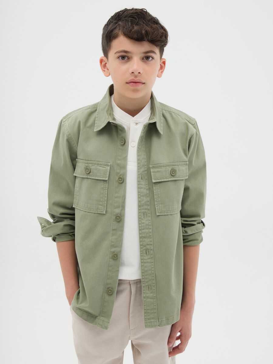 Boys&rsquo; shirt in 100% green cotton with oversized fit and button fastening_0