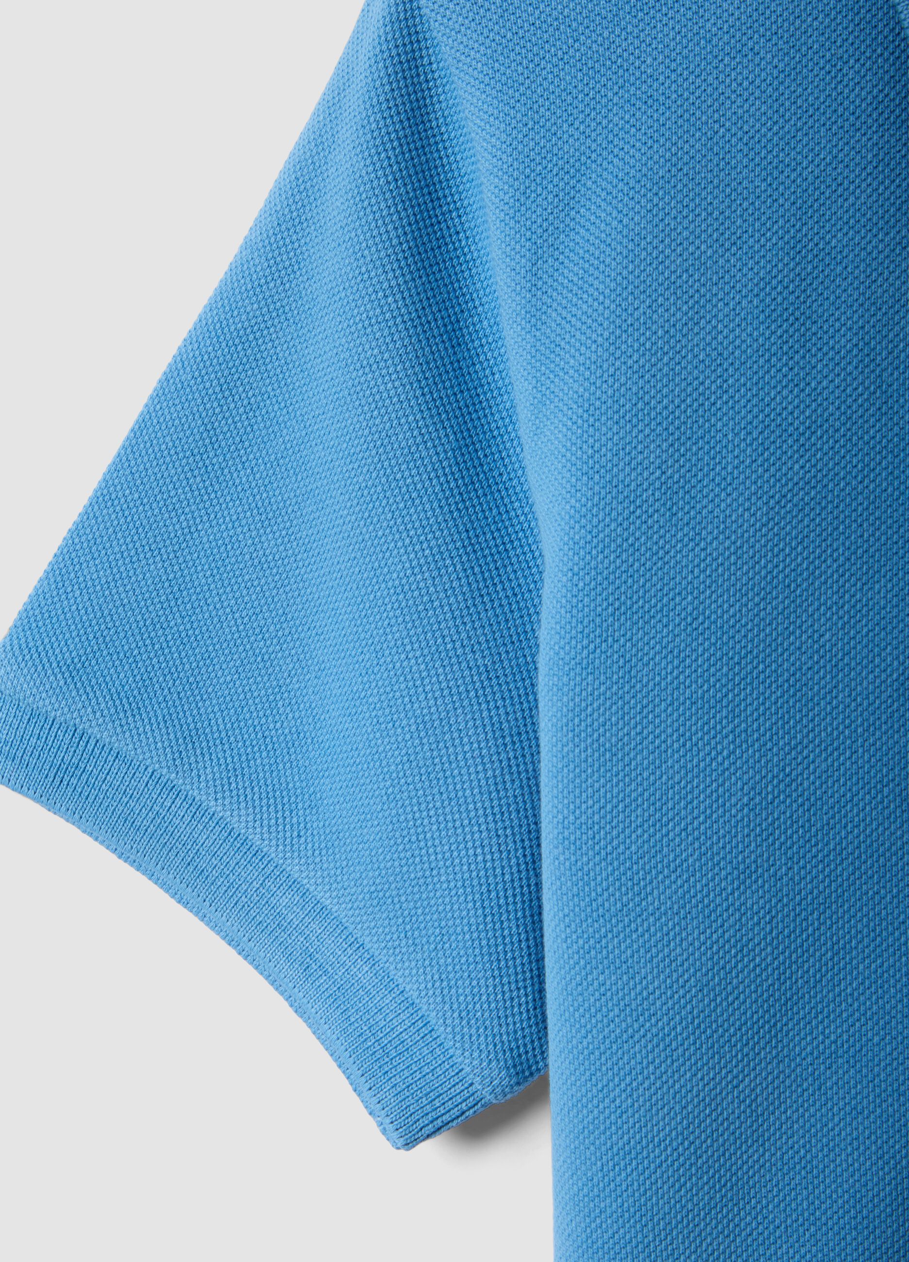 Light blue short-sleeve polo shirt in pure organic cotton for boys