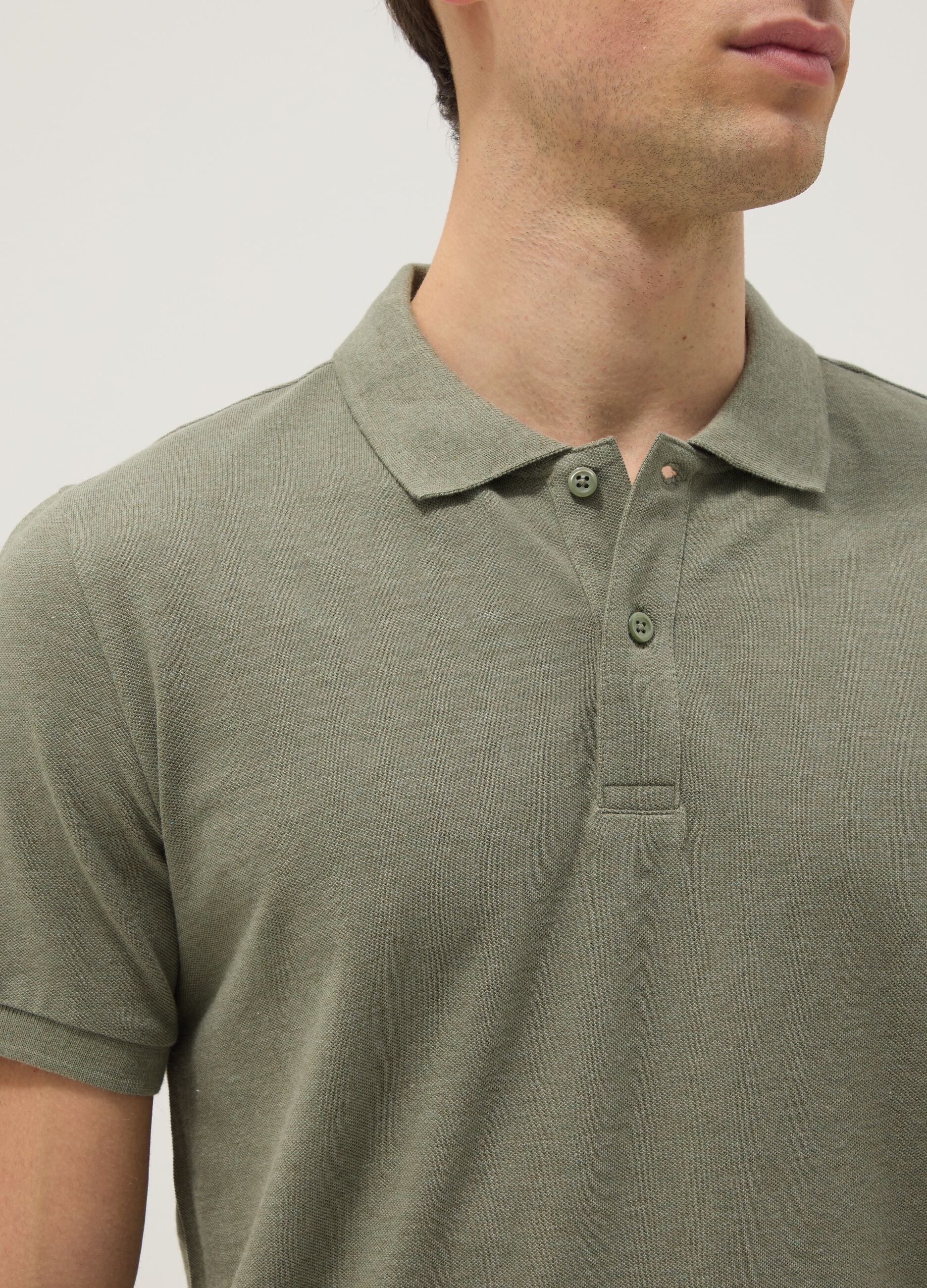 Short-sleeved green polo shirt in pure cotton