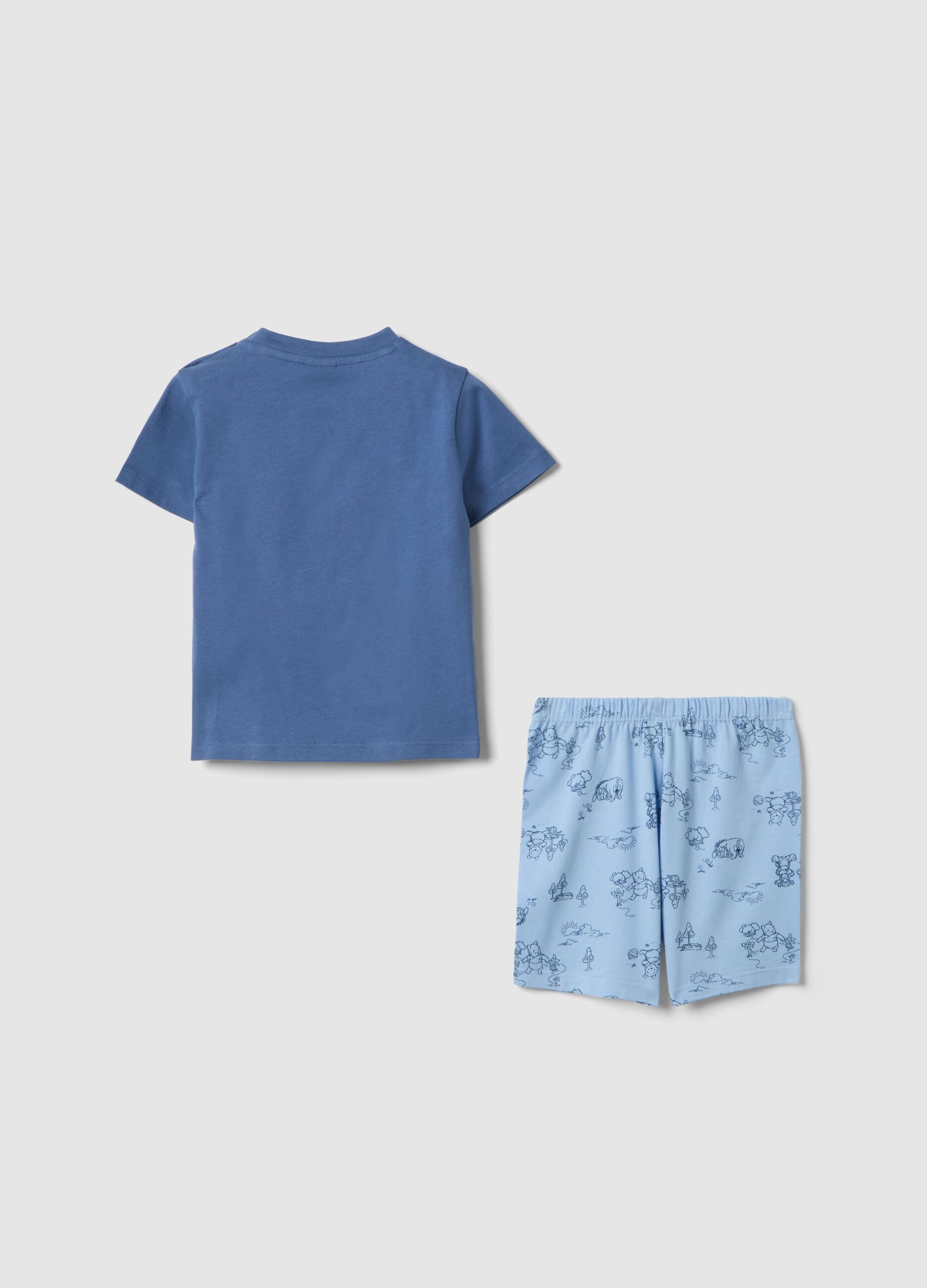 Short multicolour cotton pyjamas for babies featuring Winnie-the-Pooh