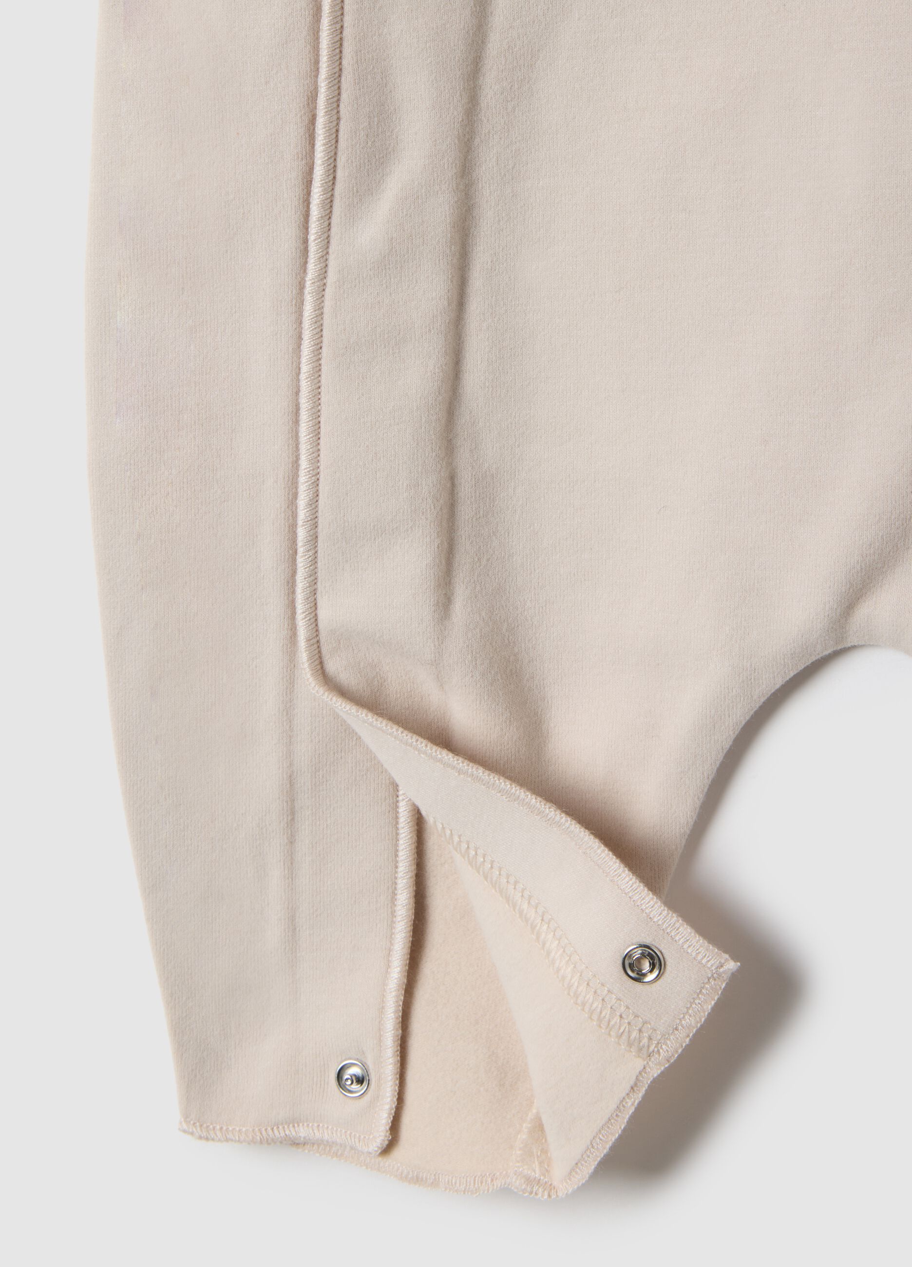 Beige newborn sleepsuit in stretch cotton perfect fit