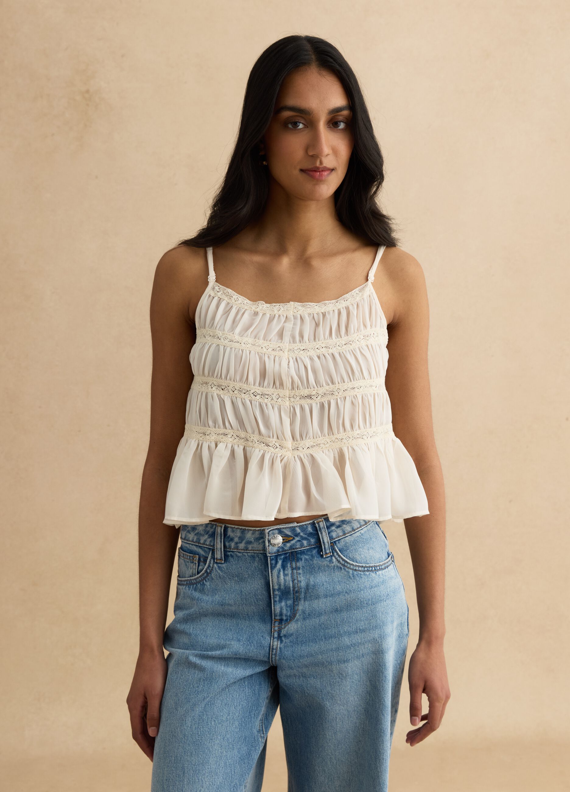 Sleeveless top with ruffled shirring and crochet lace inserts