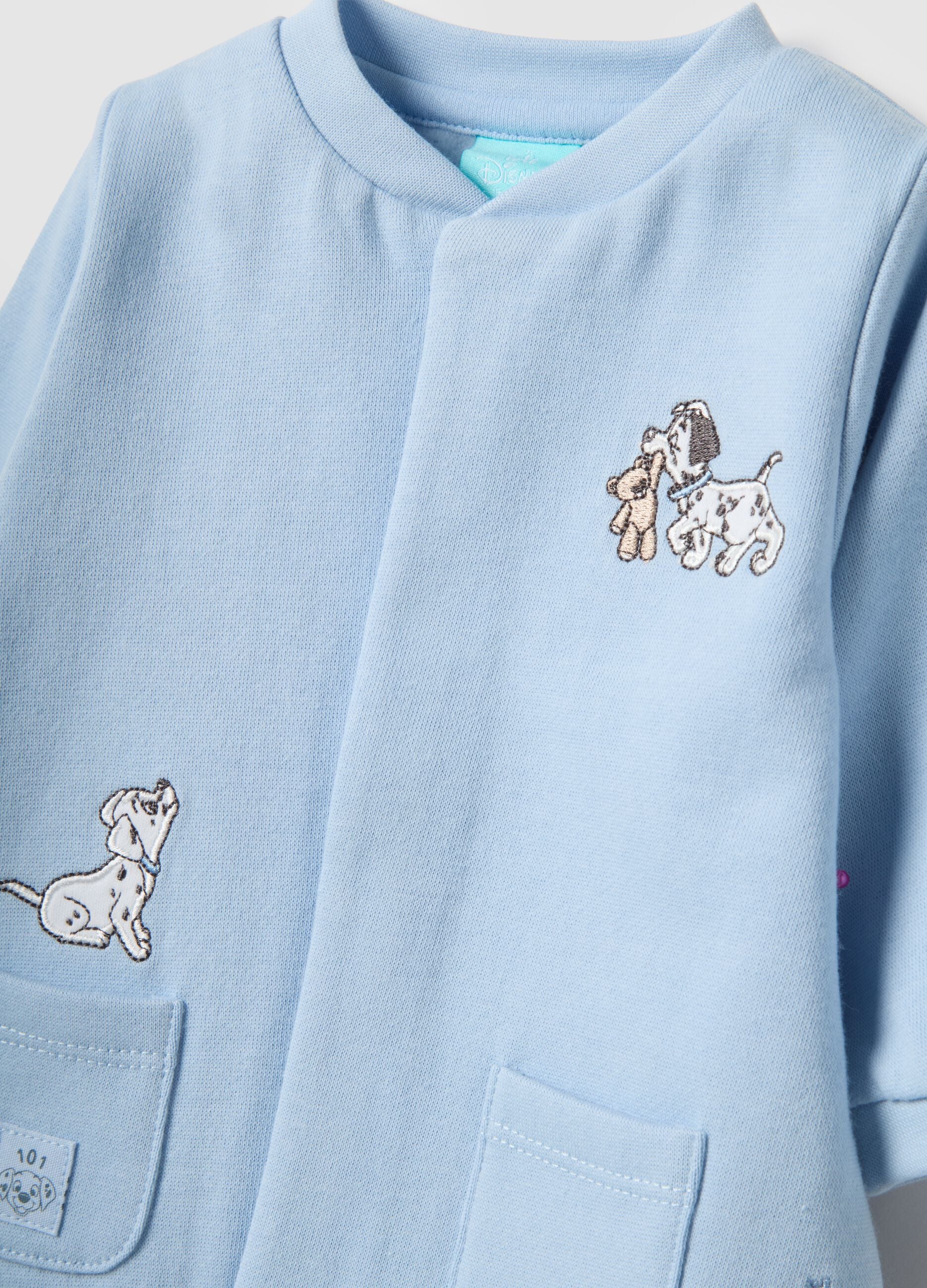 Baby blue romper in pure cotton with appliqu&eacute;s