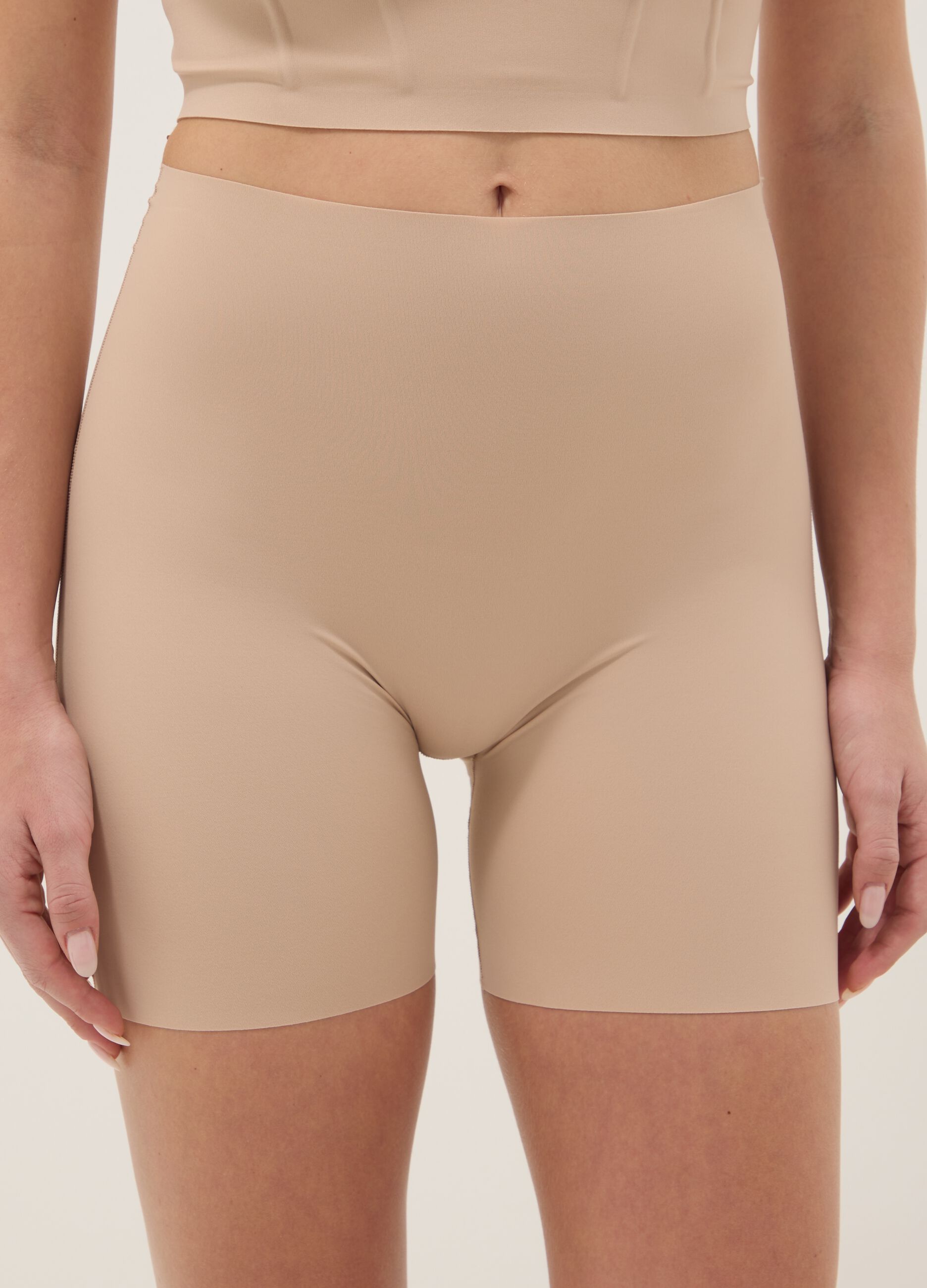 High-waisted beige briefs
