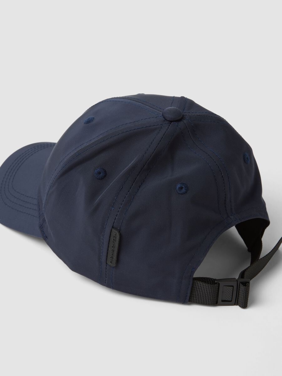 Blue cap with curved peak_2