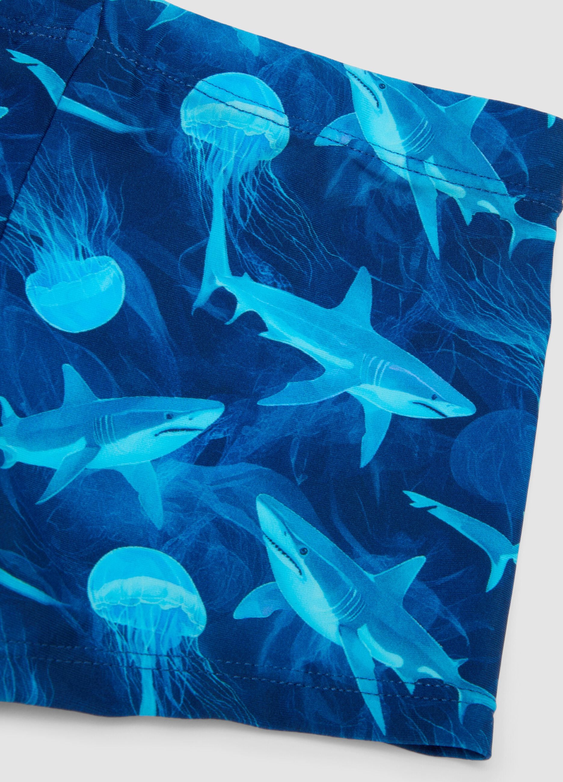 Blue stretch swim shorts with shark print