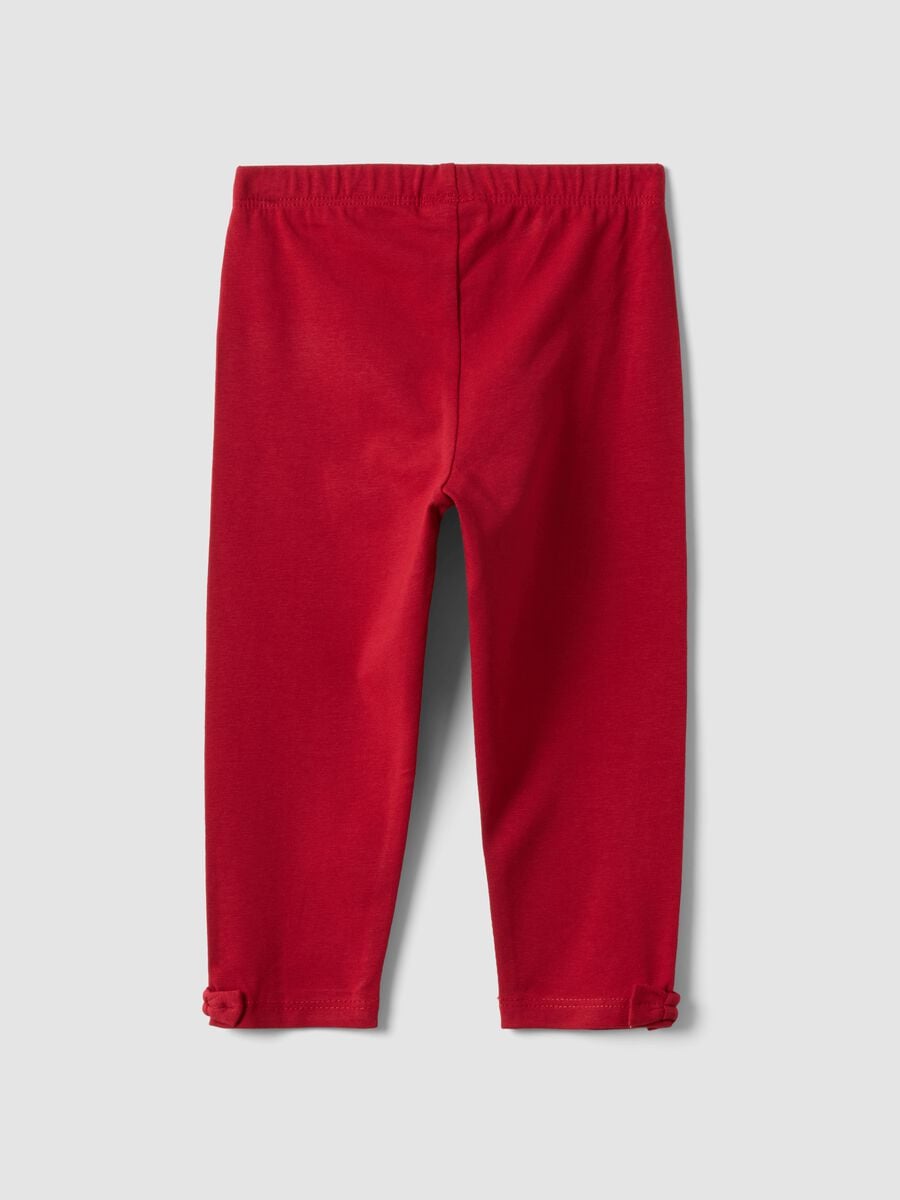 Red stretch organic cotton leggings with bow details for baby girl_1