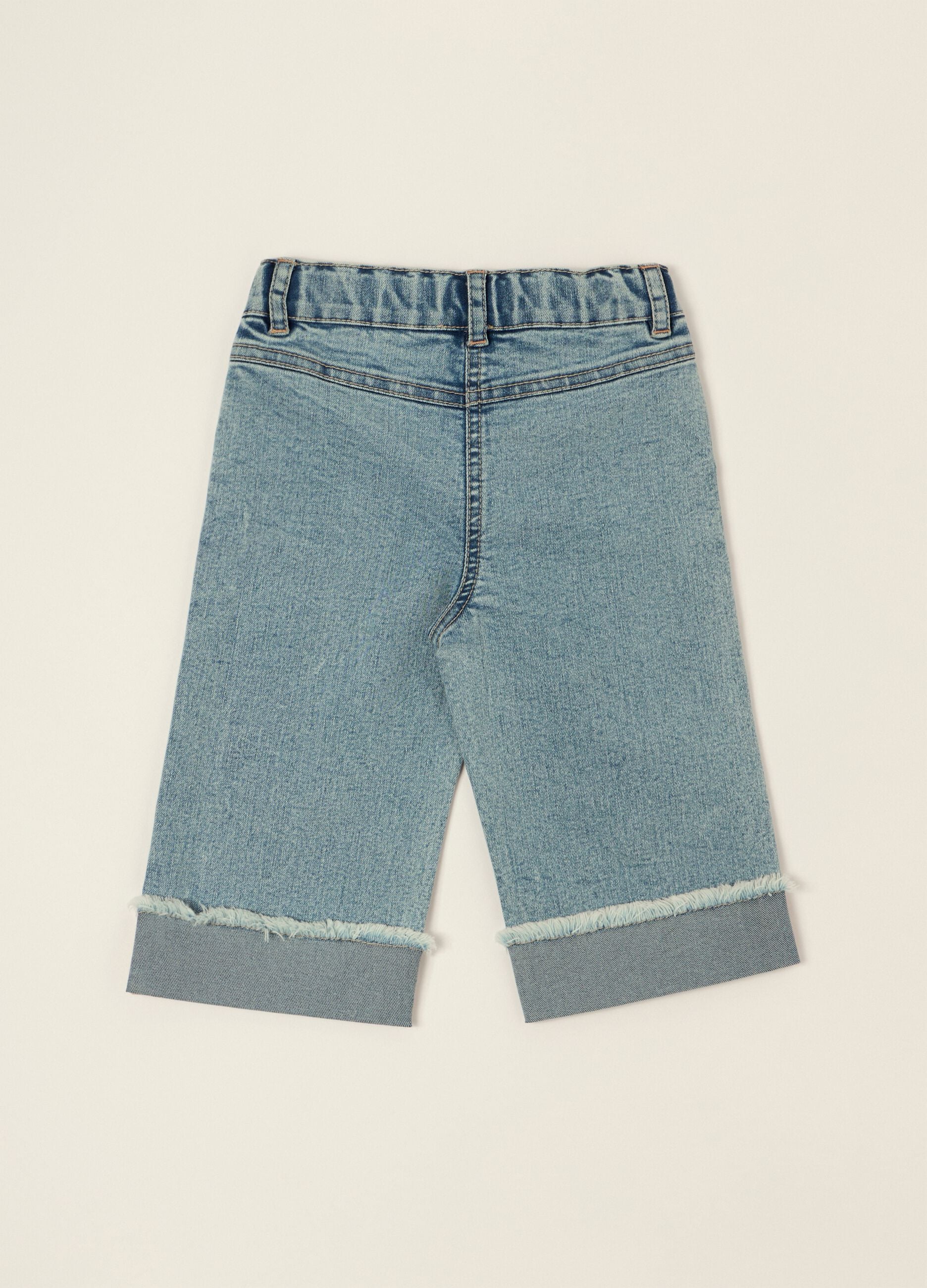 Stretch cotton denim jeans with embroidered hearts for baby girls