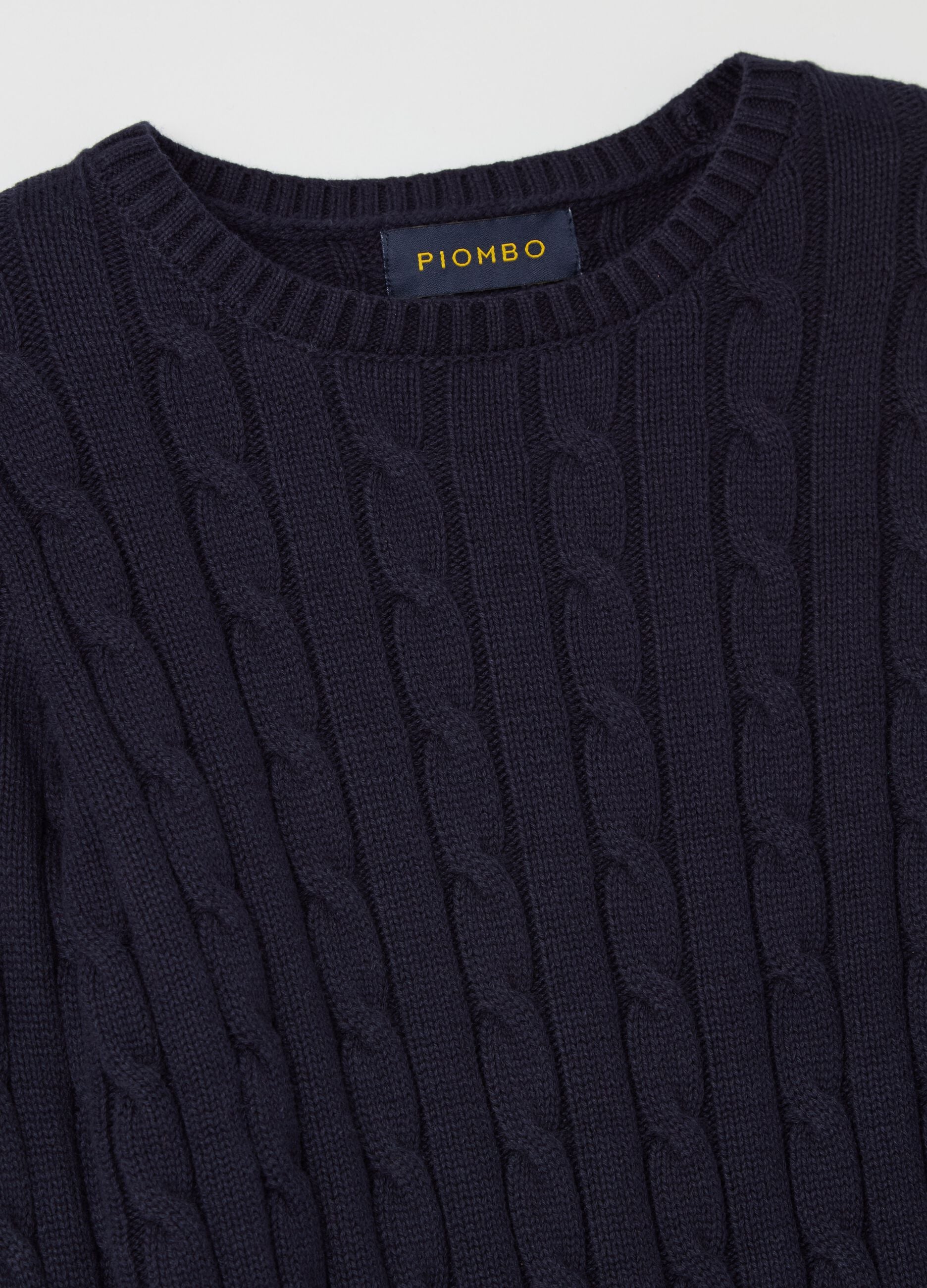 Ribbed pullover with cable-knit design