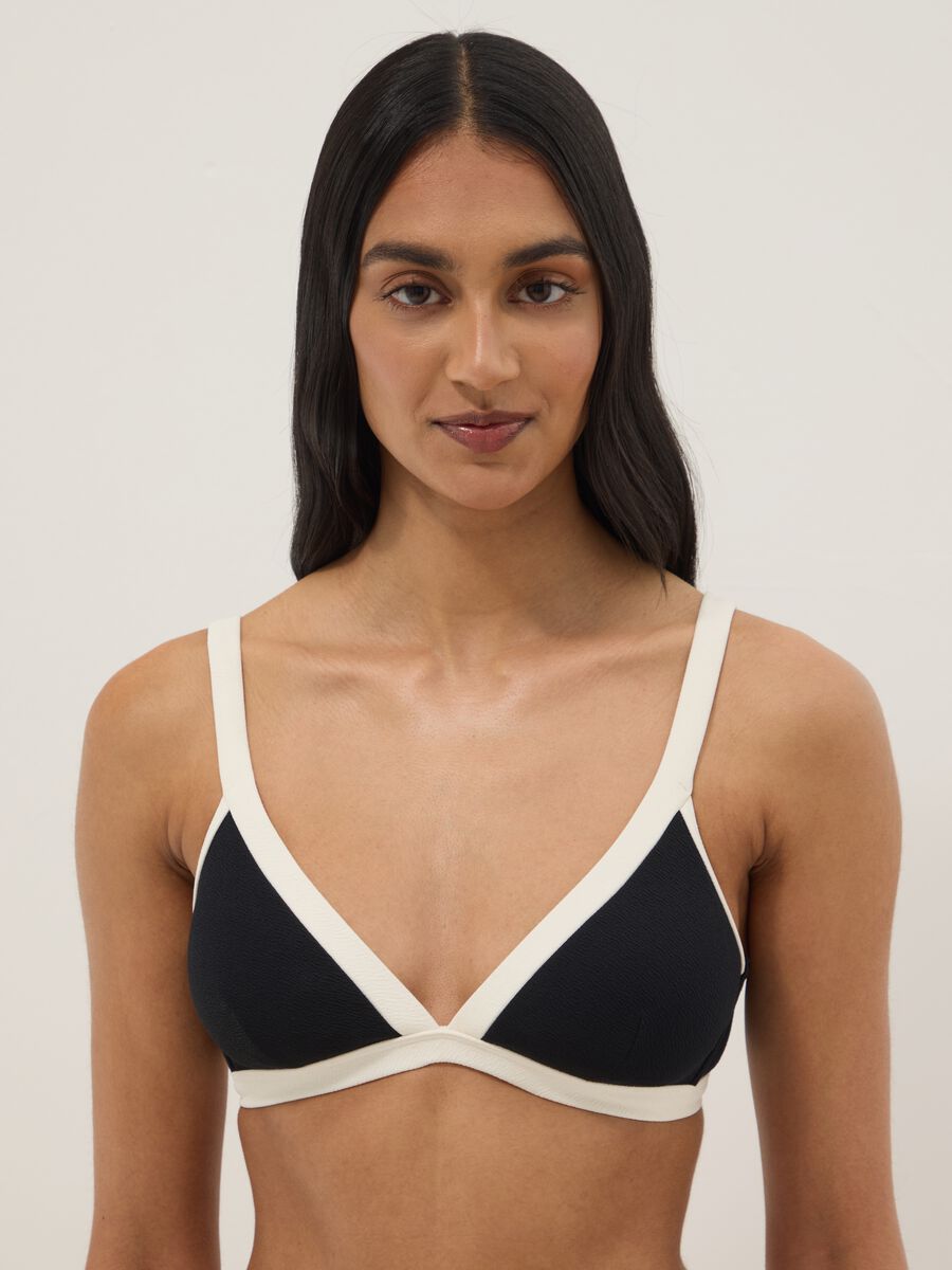 Black stretch-fabric bikini top with white trim and straps_0