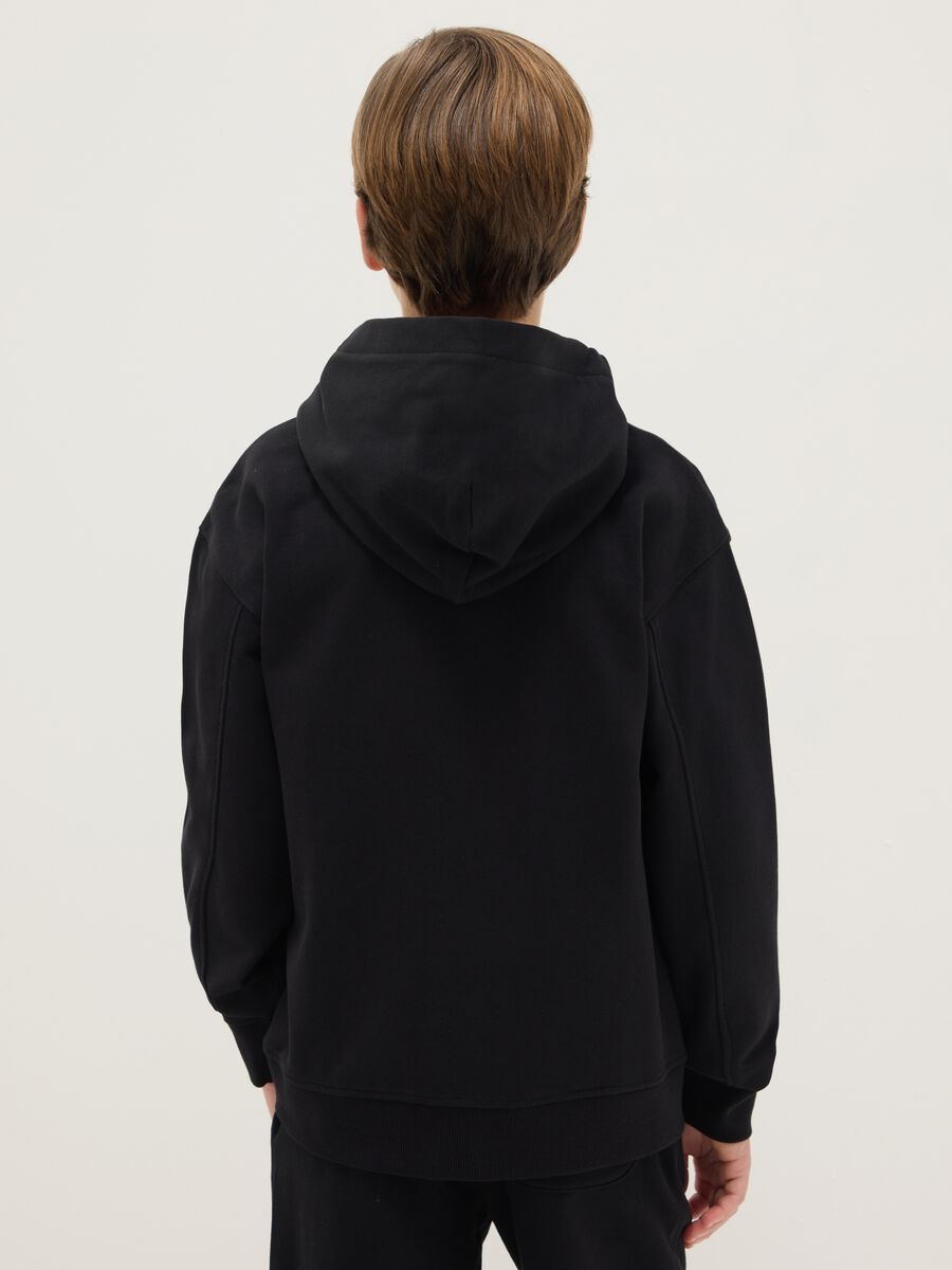 Black sweatshirt for boys in pure cotton with oversized fit, hood and zip_1