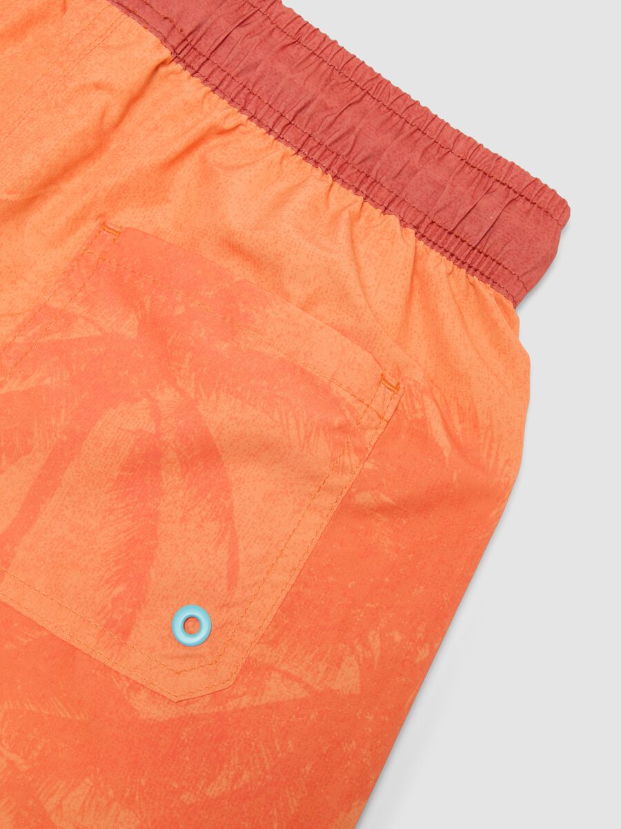Boxer da mare arancione da ragazzo con stampa tropicale_3