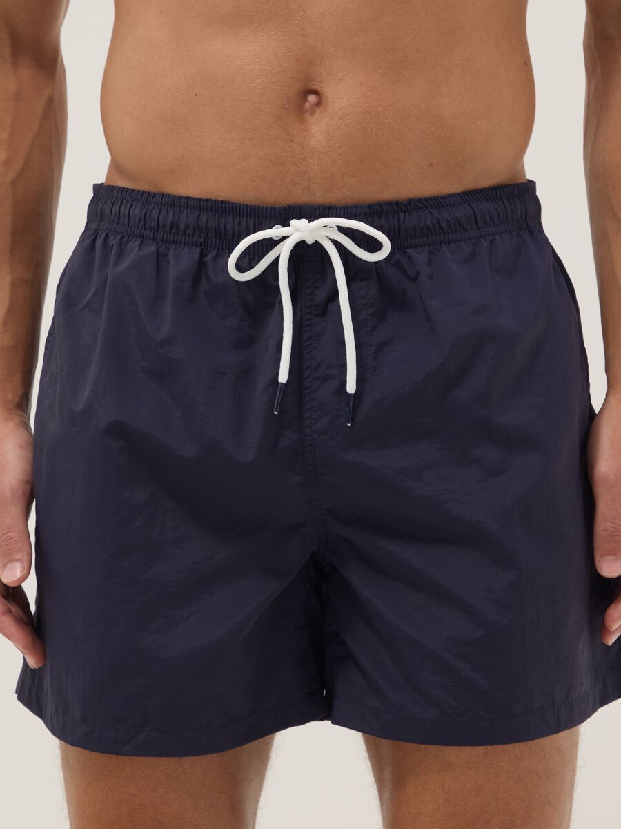 Blue regular-fit swim shorts with drawstring_1