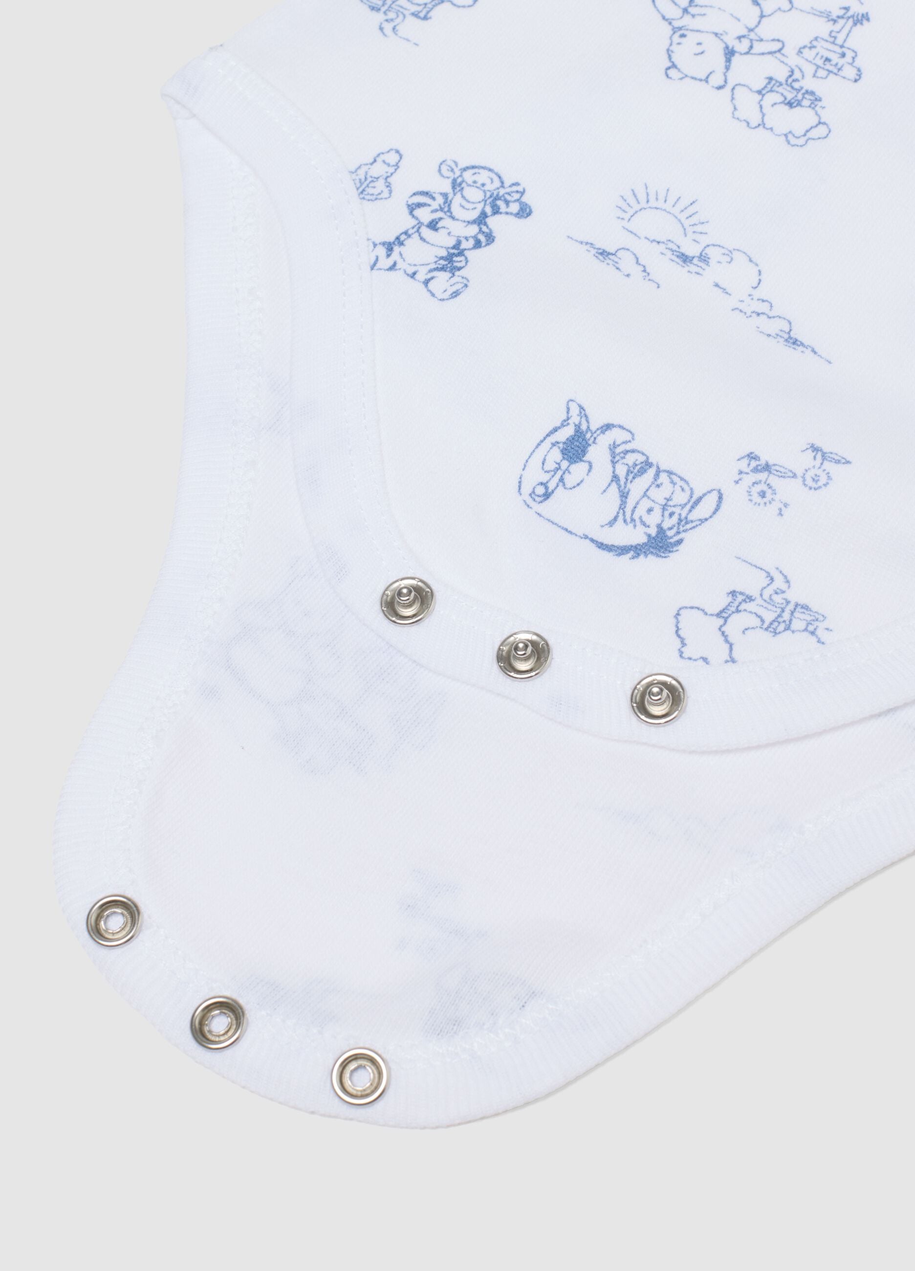 Pack of multicolour newborn cotton bodysuits with Winnie-The-Pooh