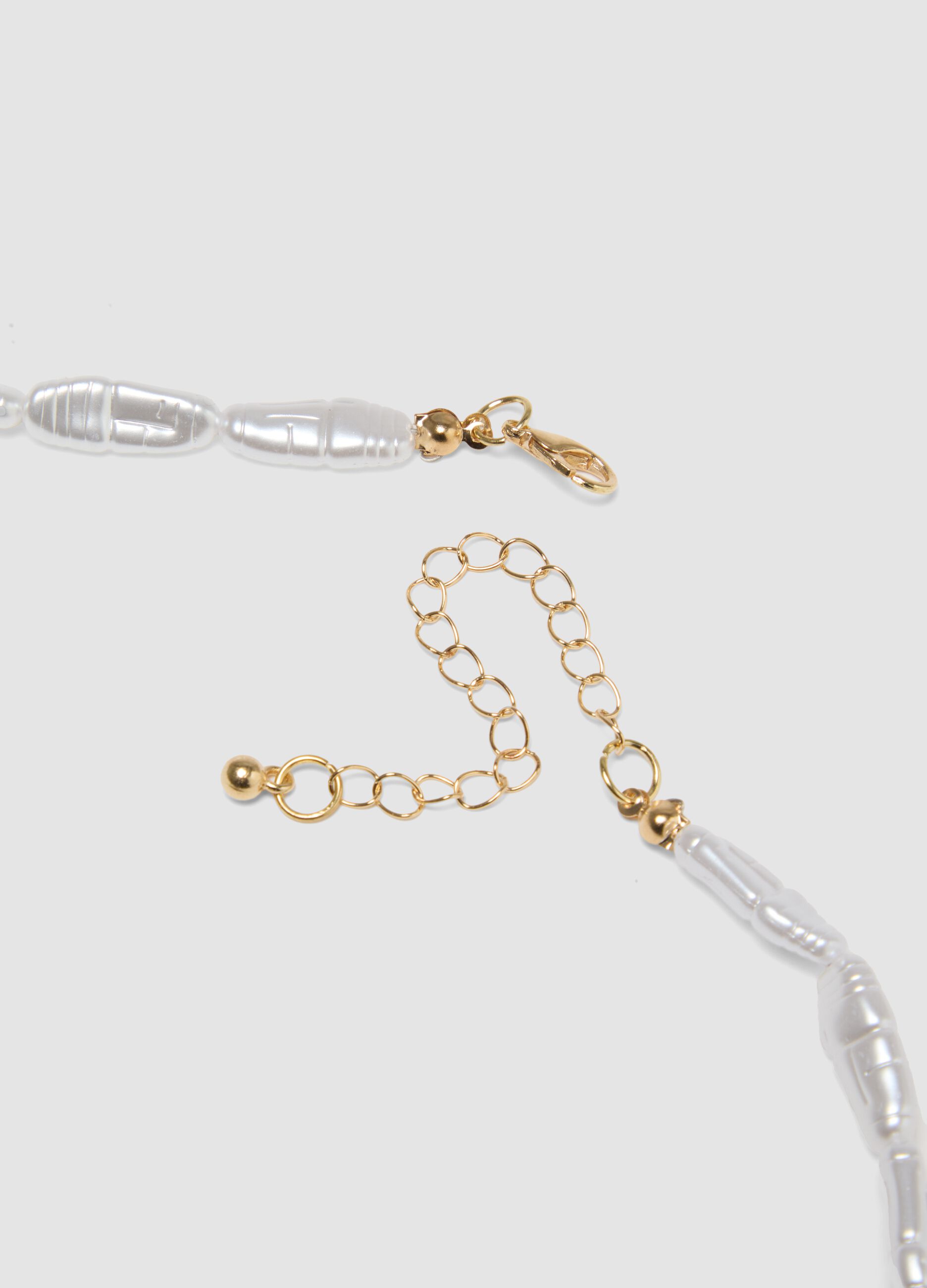 Necklace with transparent beads and fruit-shaped charms