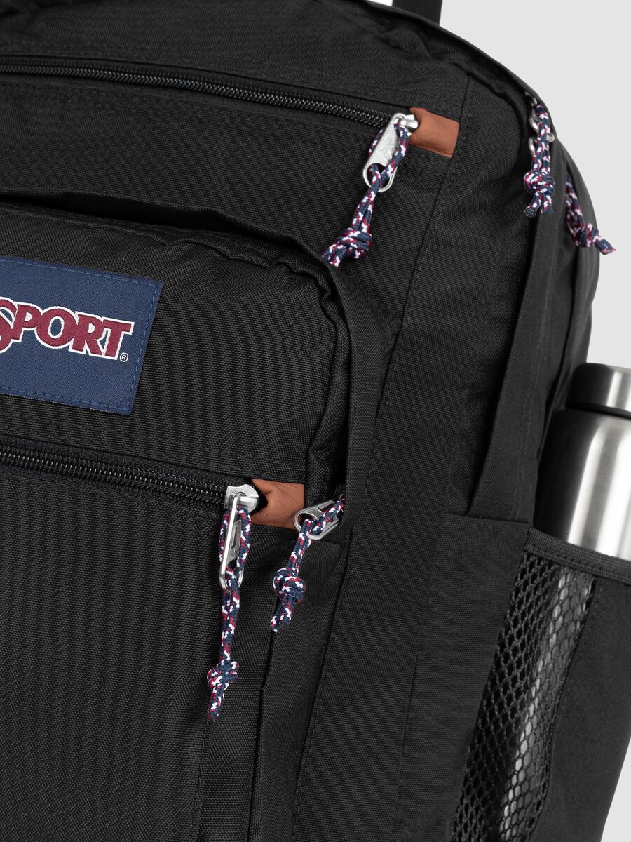 Black backpack with brown base and external pockets_4