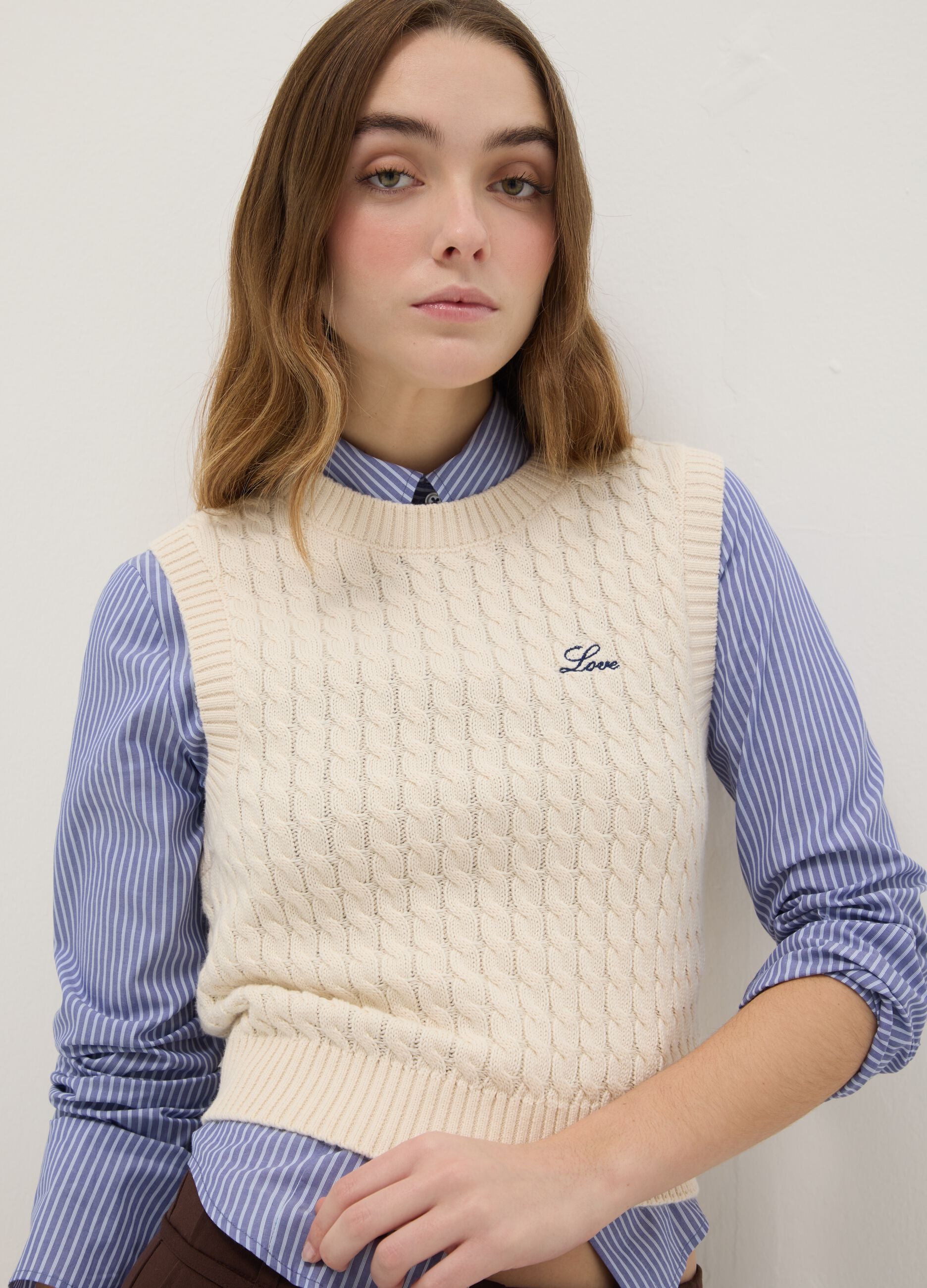 Beige pure cotton regular fit waistcoat with cable knit design