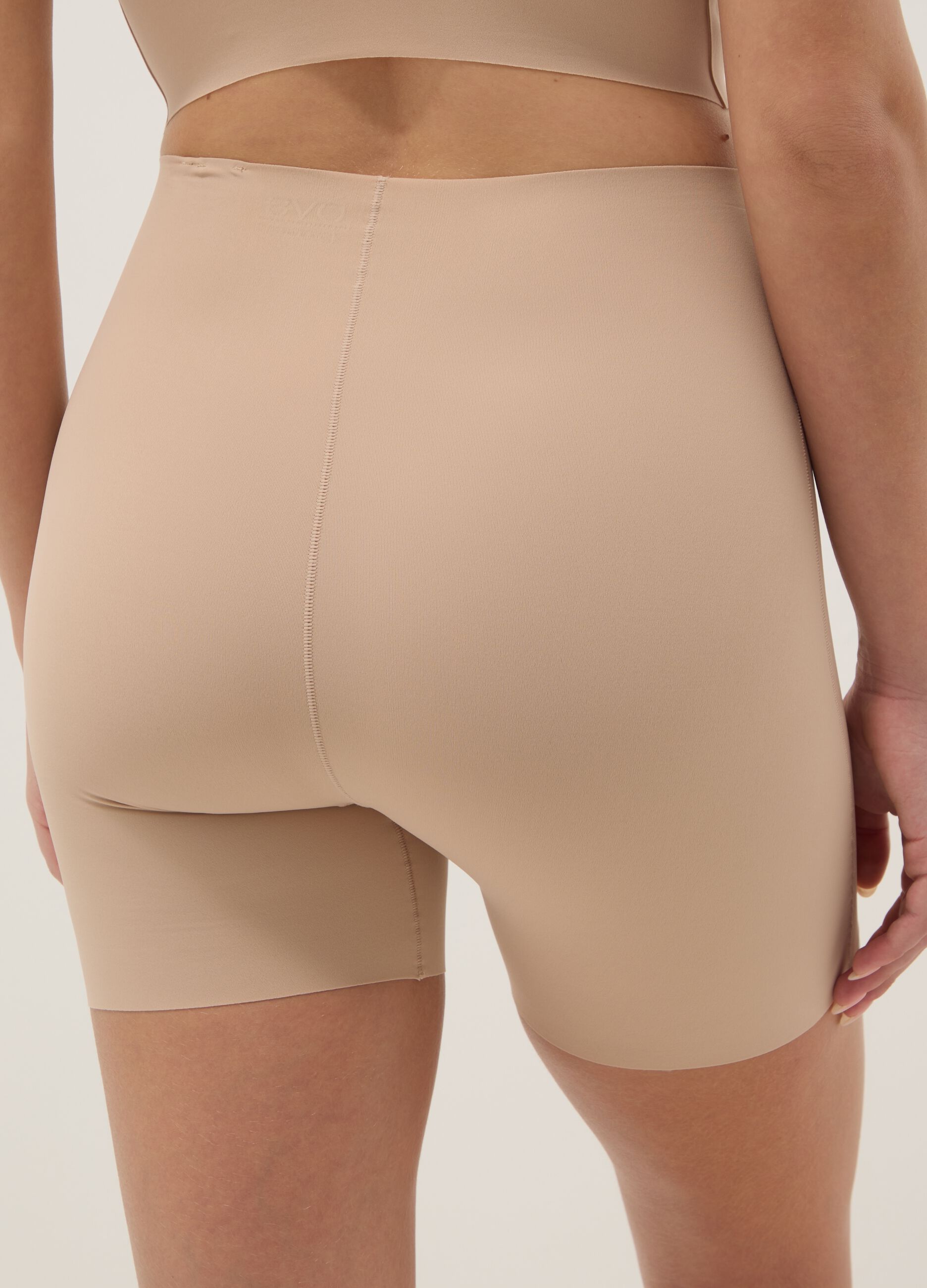 High-waisted beige briefs