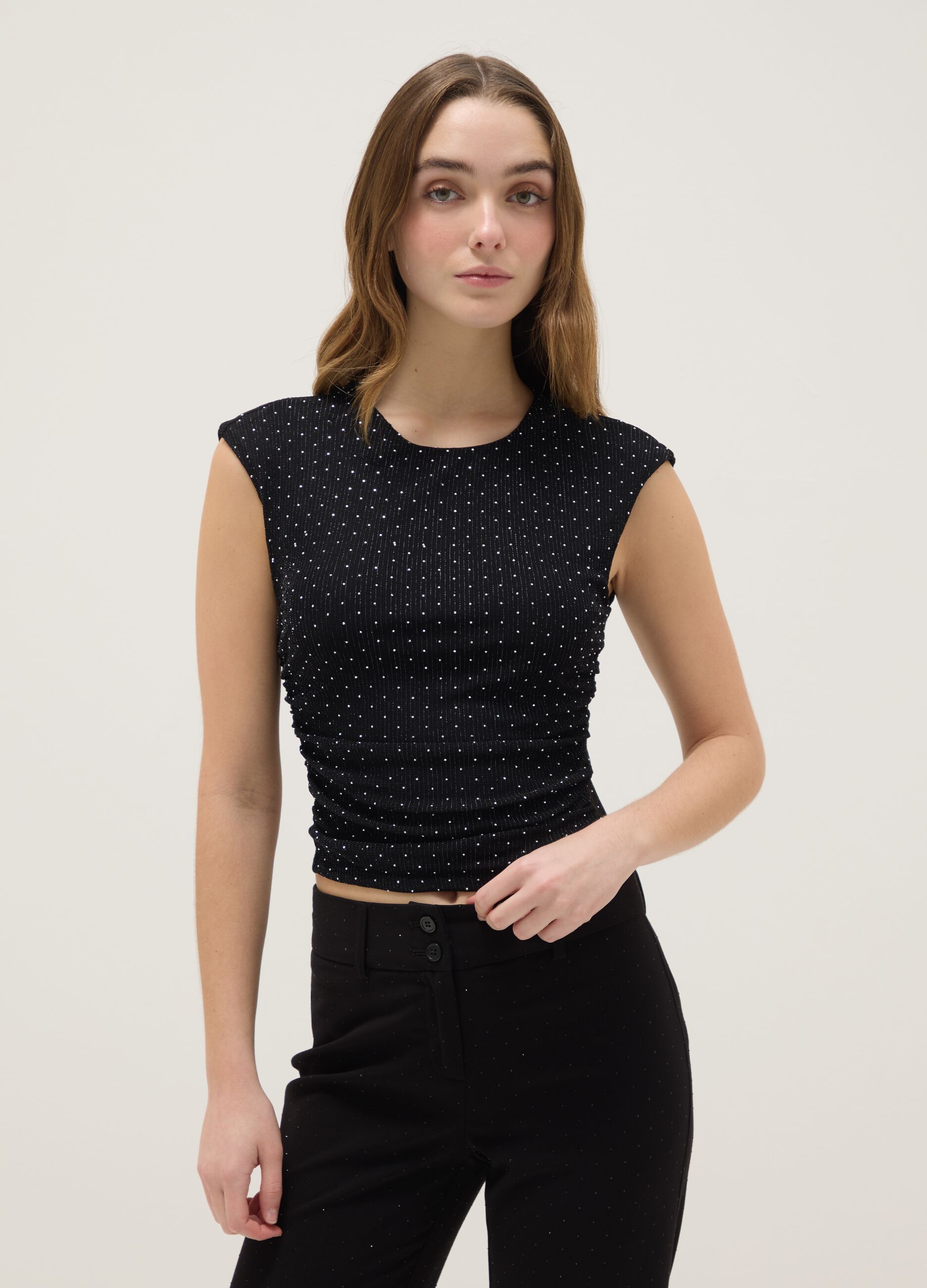 Black sleeveless top regular fit with back open and rhinestones