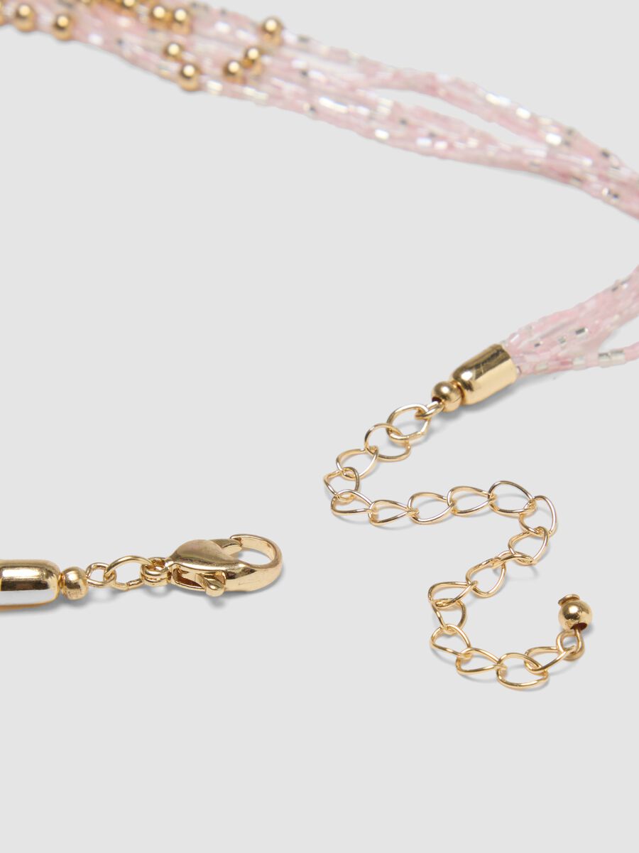 Multi-strand necklace with gold and pink beads_1