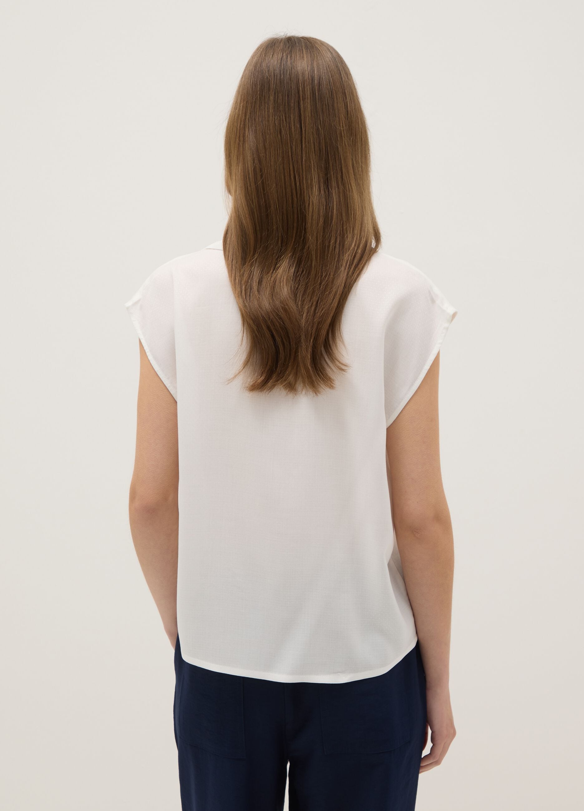 White sleeveless blouse in pure viscose regular fit with V-neck