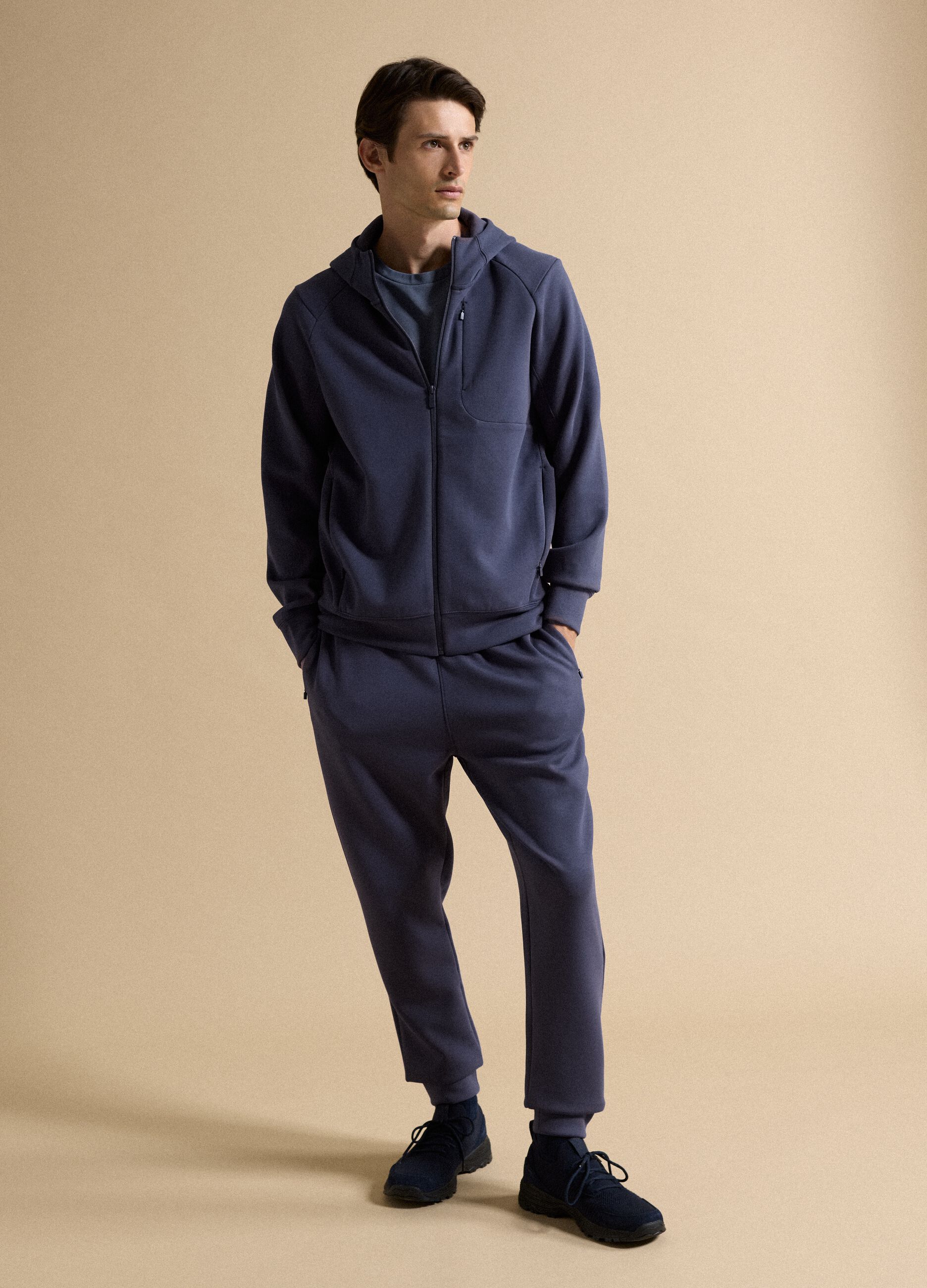 Breathable blue full-zip in 2-way stretch fabric