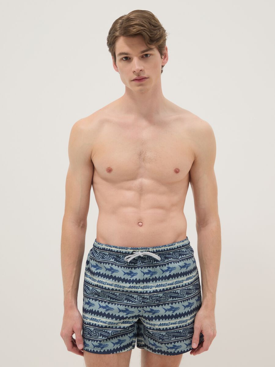 Multicolour swim shorts with sharks and geometric patterns_0