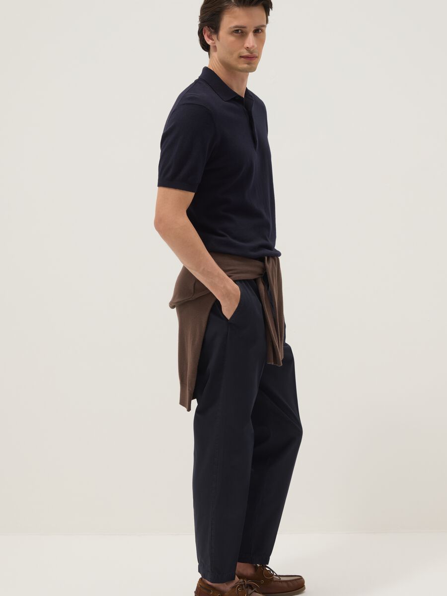 Blue cotton chino trousers with carrot fit_1