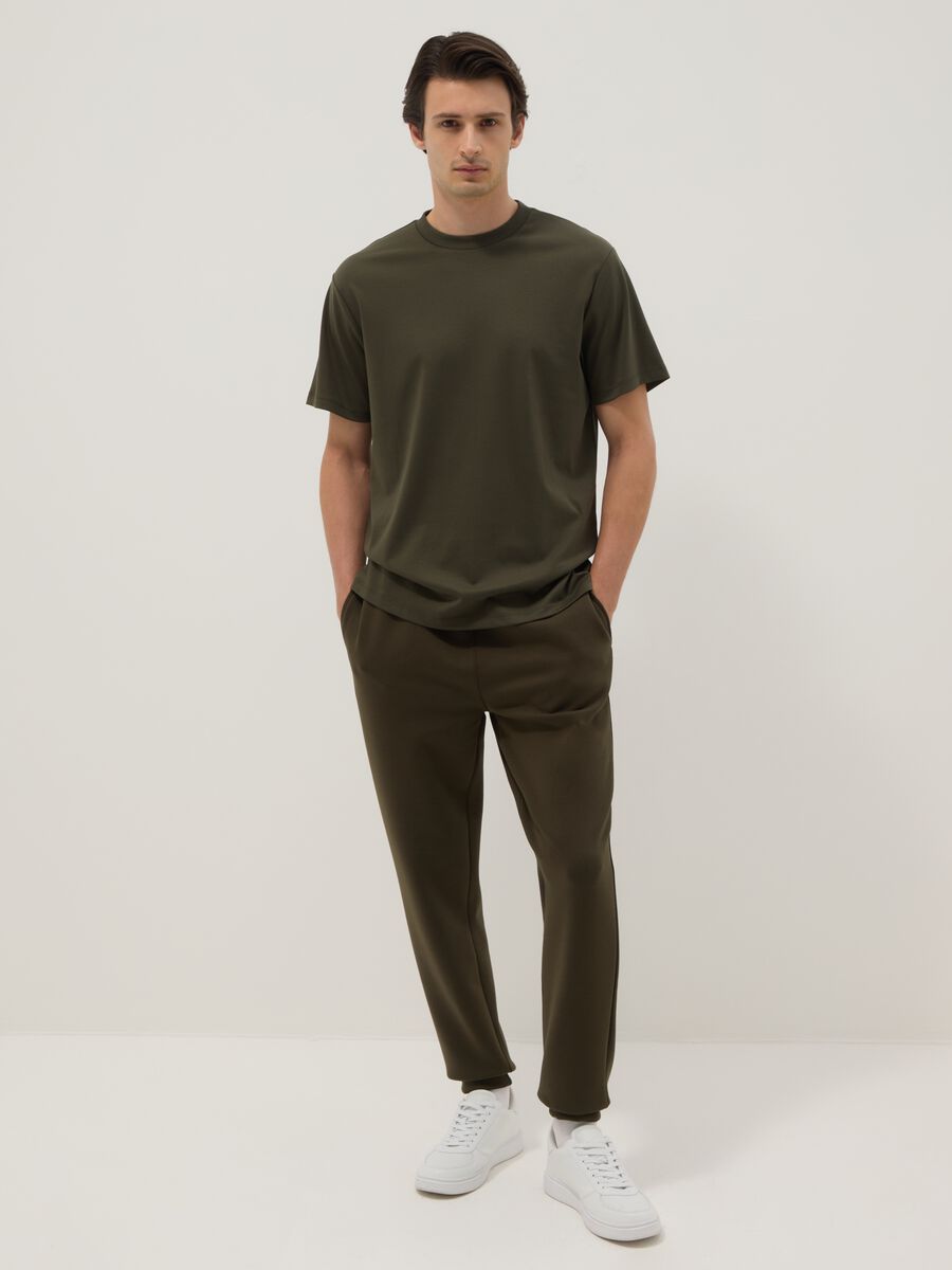 Brown cotton blend regular fit jogger trousers_0