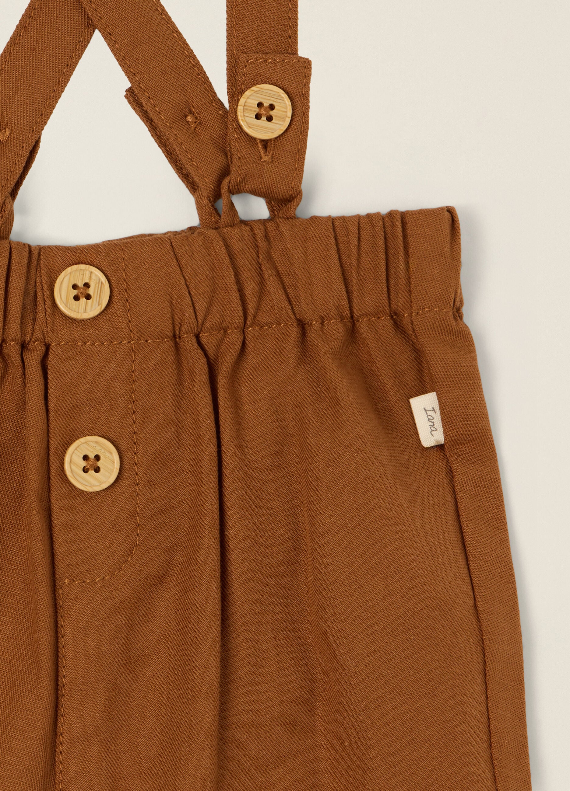 Brown cotton-linen blend trousers with suspenders