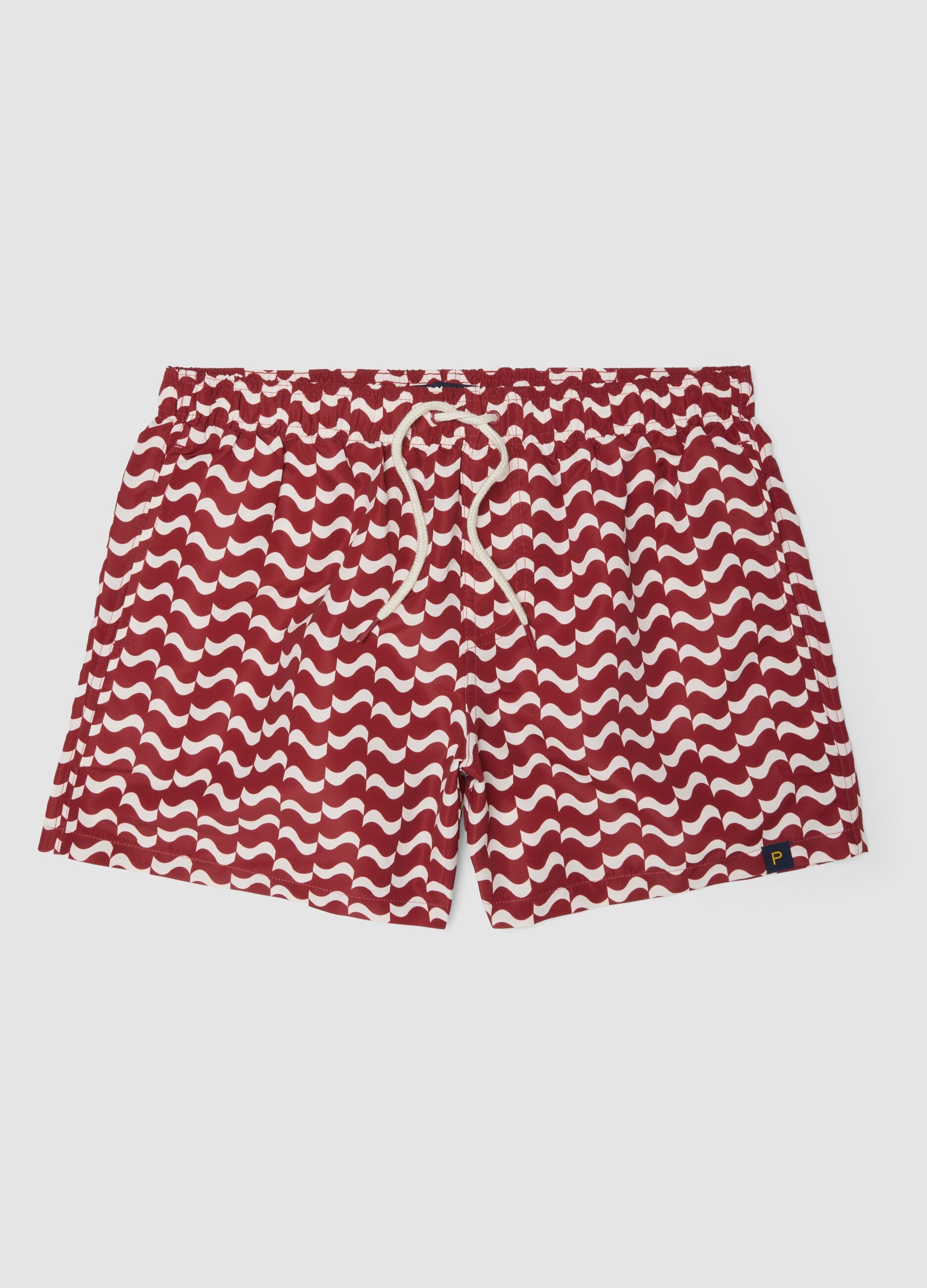 Red men&rsquo;s swim shorts with all-over print