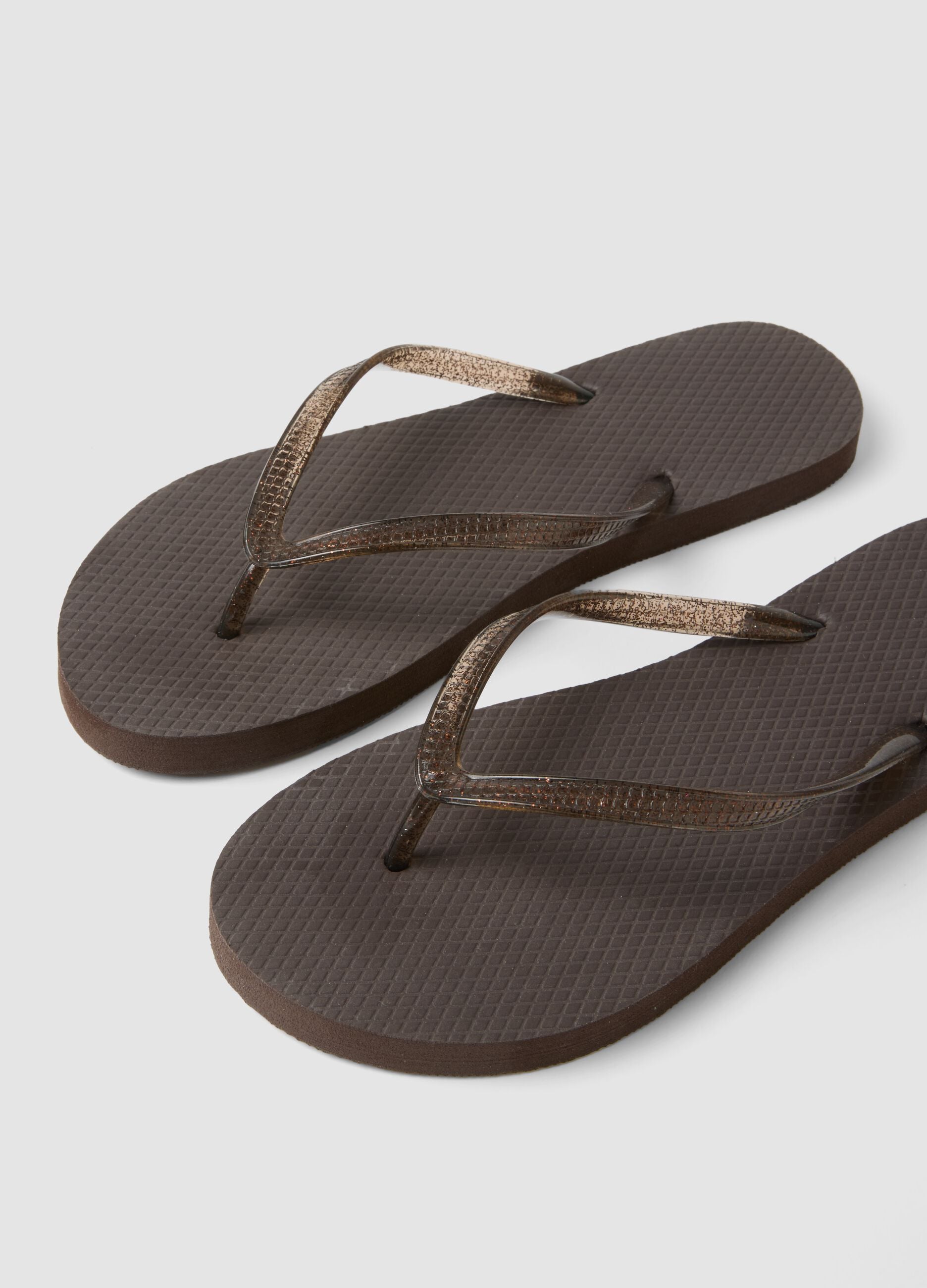 Brown flip-flops with translucent straps